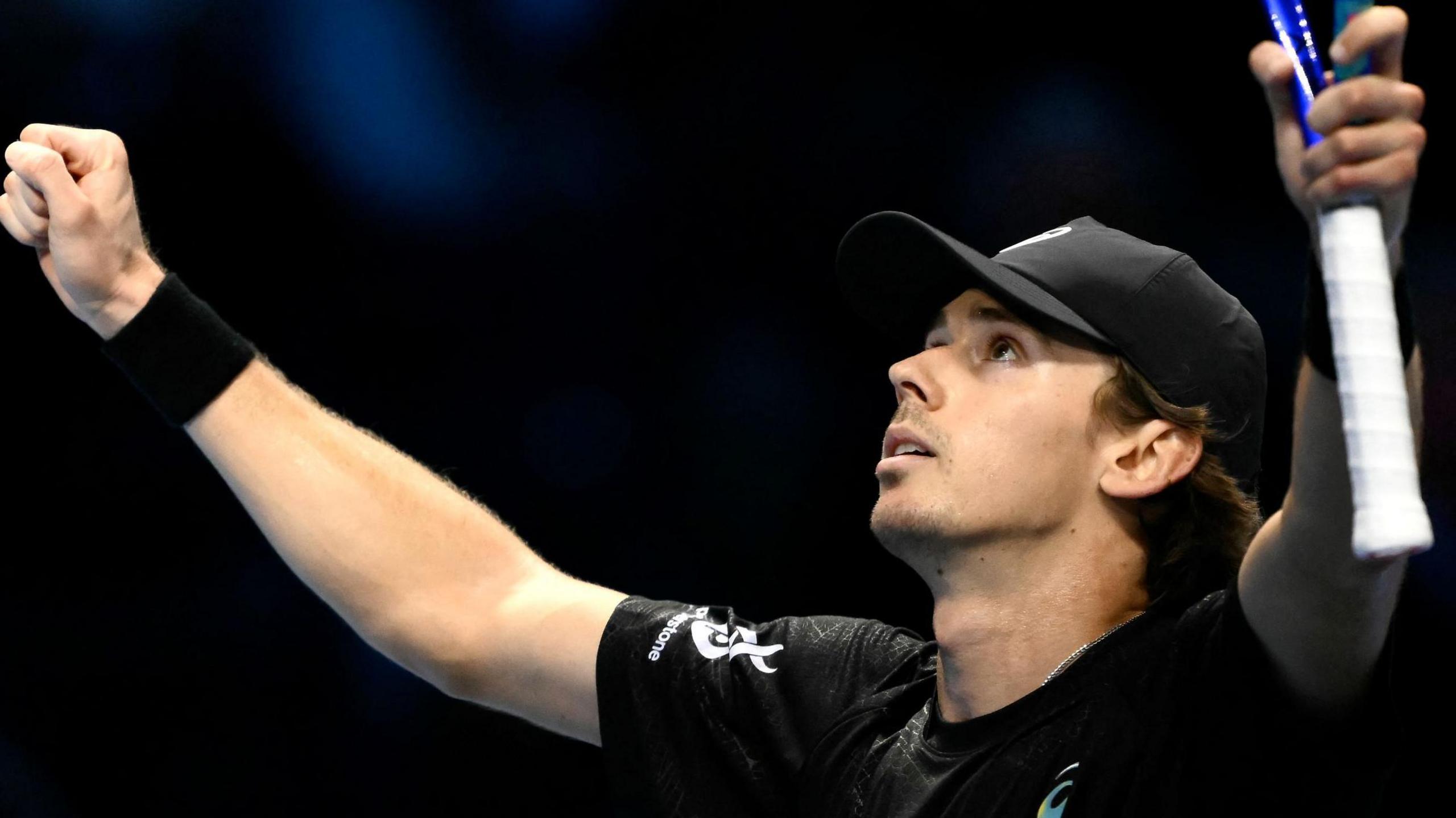 Alex de Minaur celebrates his victory against Taylor Fritz at the ATP Finals