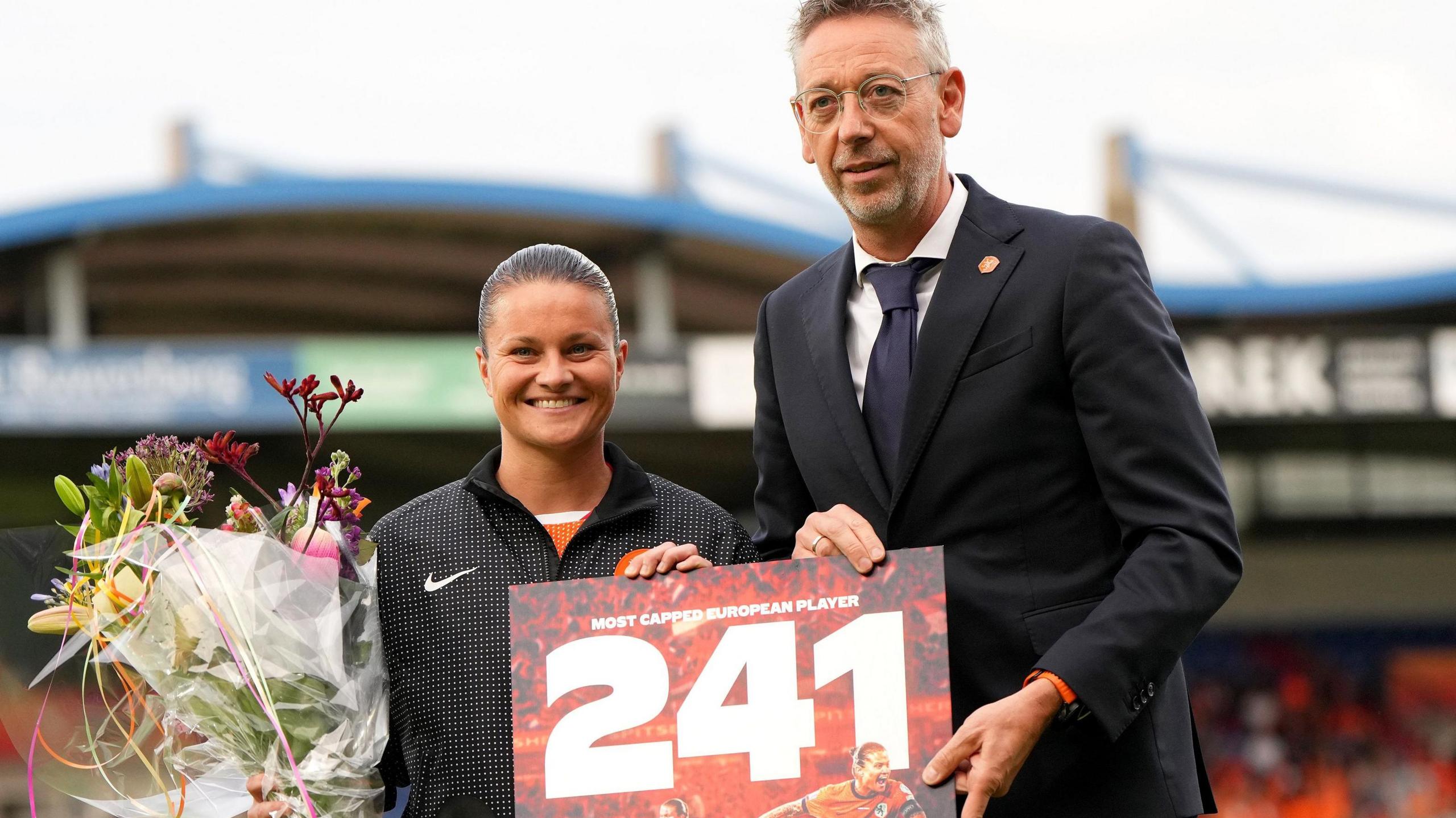 Sherida Spitse receives flowers to mark record appearance