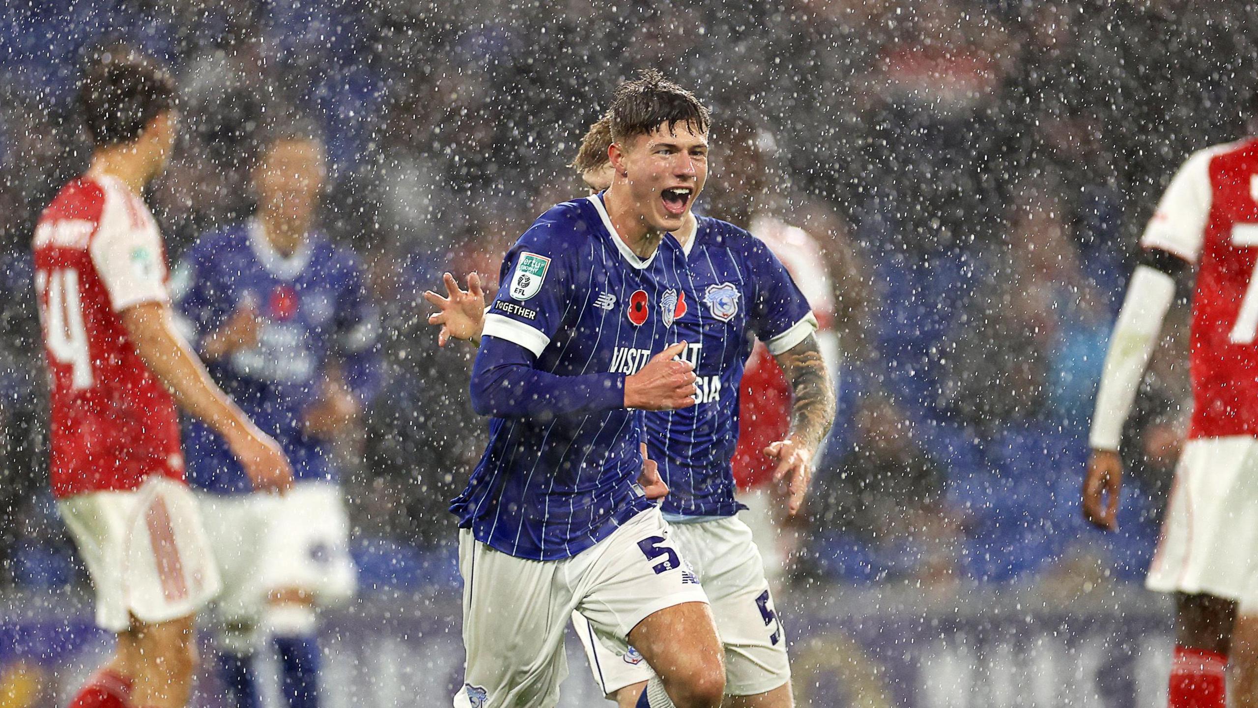 Troy Perrett celebrates 