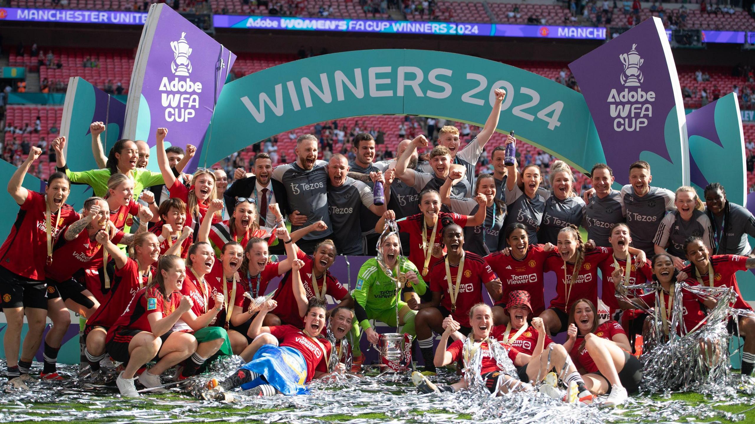 Manchester United players celebrate after winning the Women's FA Cup at Wembley