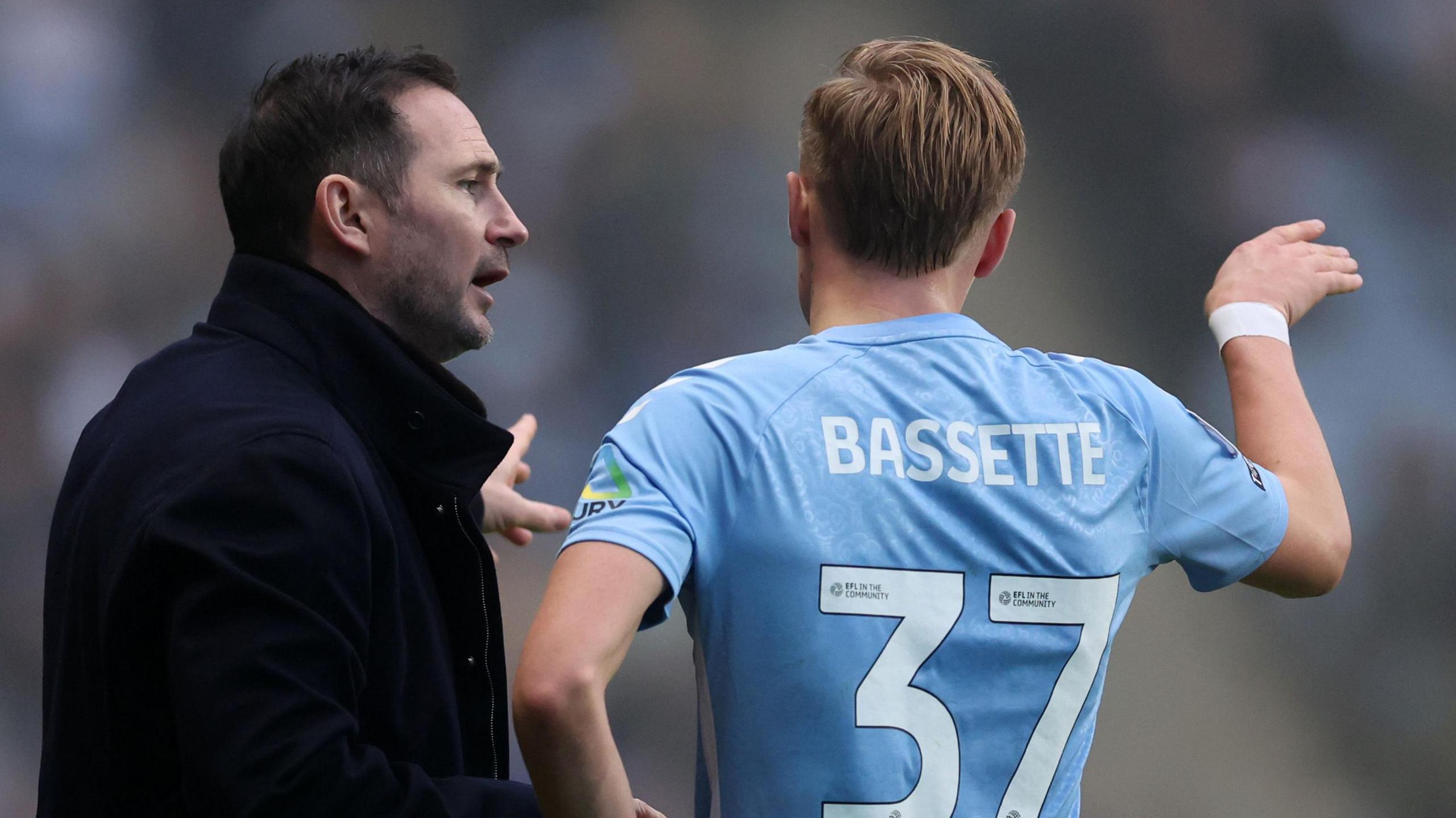 Coventry City boss Frank Lampard speaking with striker Norman Bassette