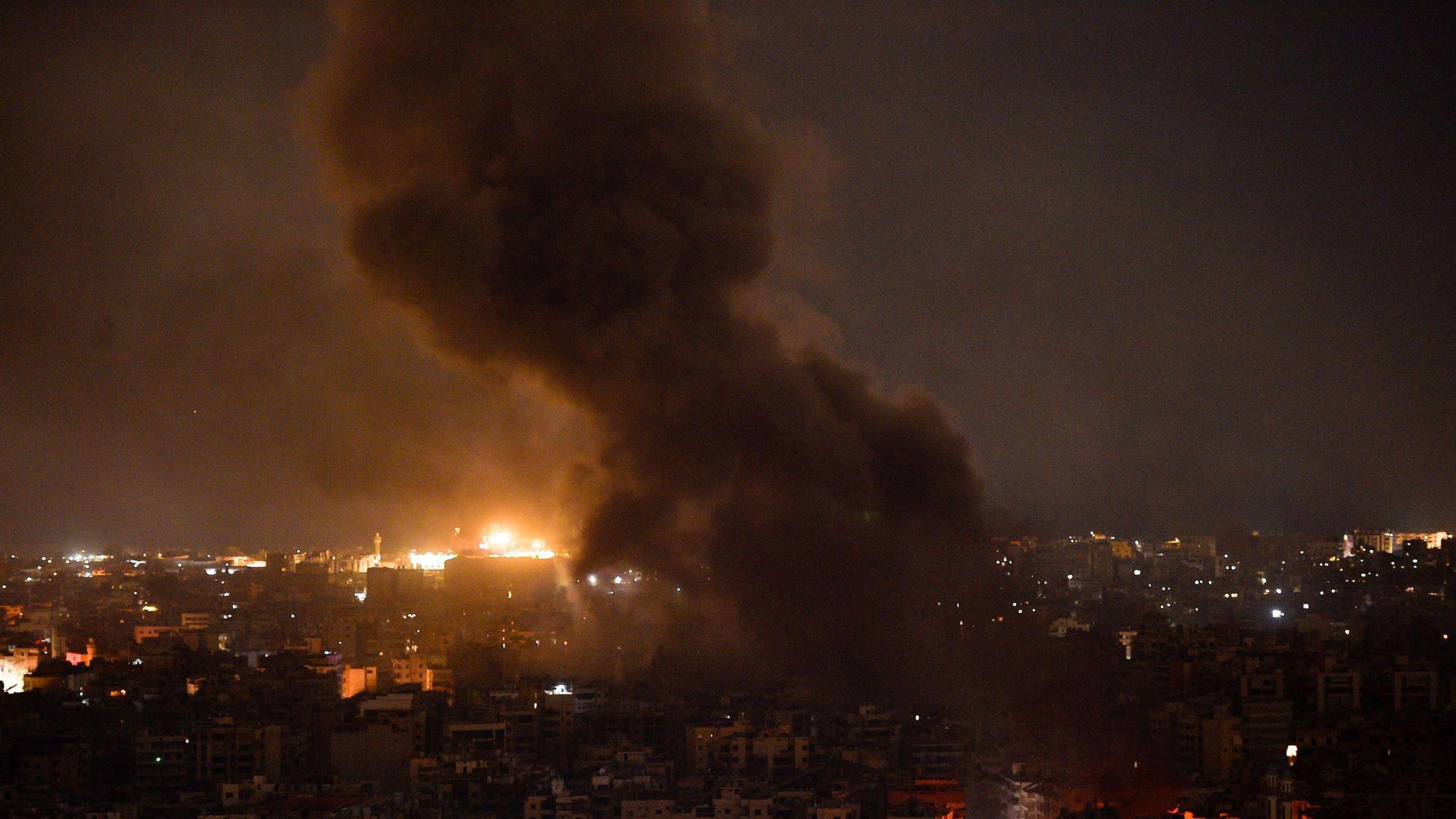 Fire and smoke rising up from buildings in Beirut after Israel bombed the city