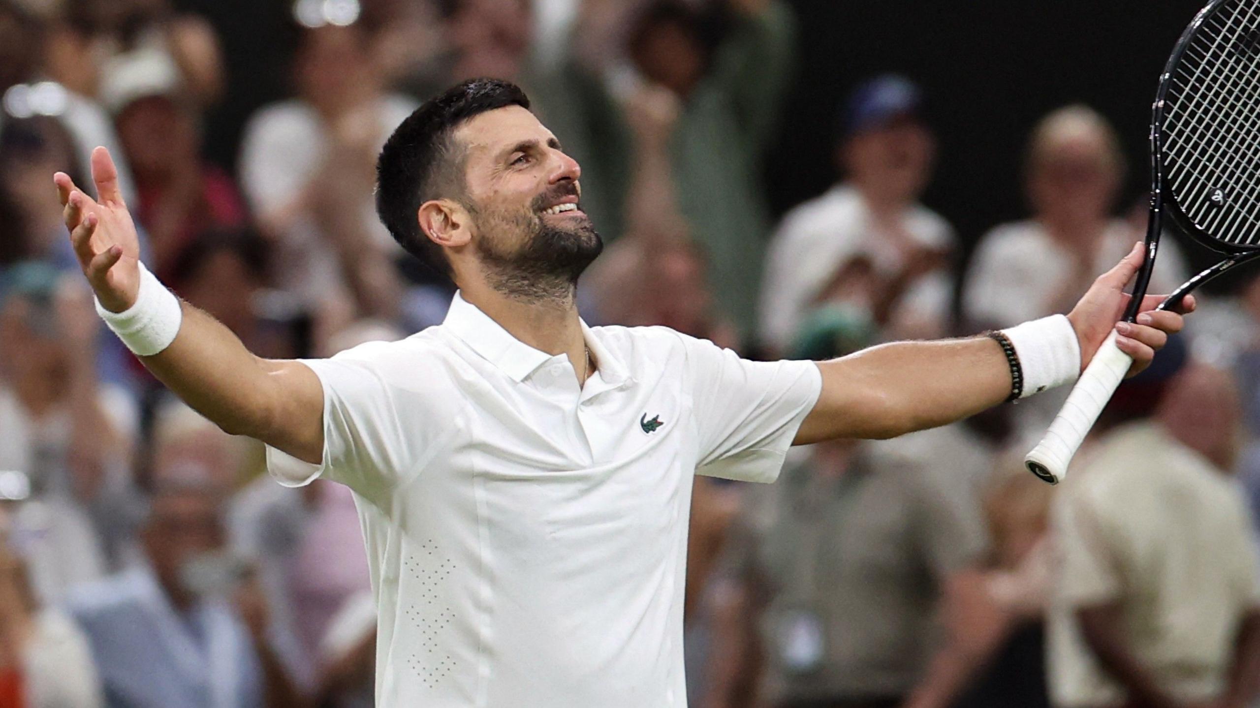 Novak Djokovic celebrates victory over Felix Auger-Aliassime