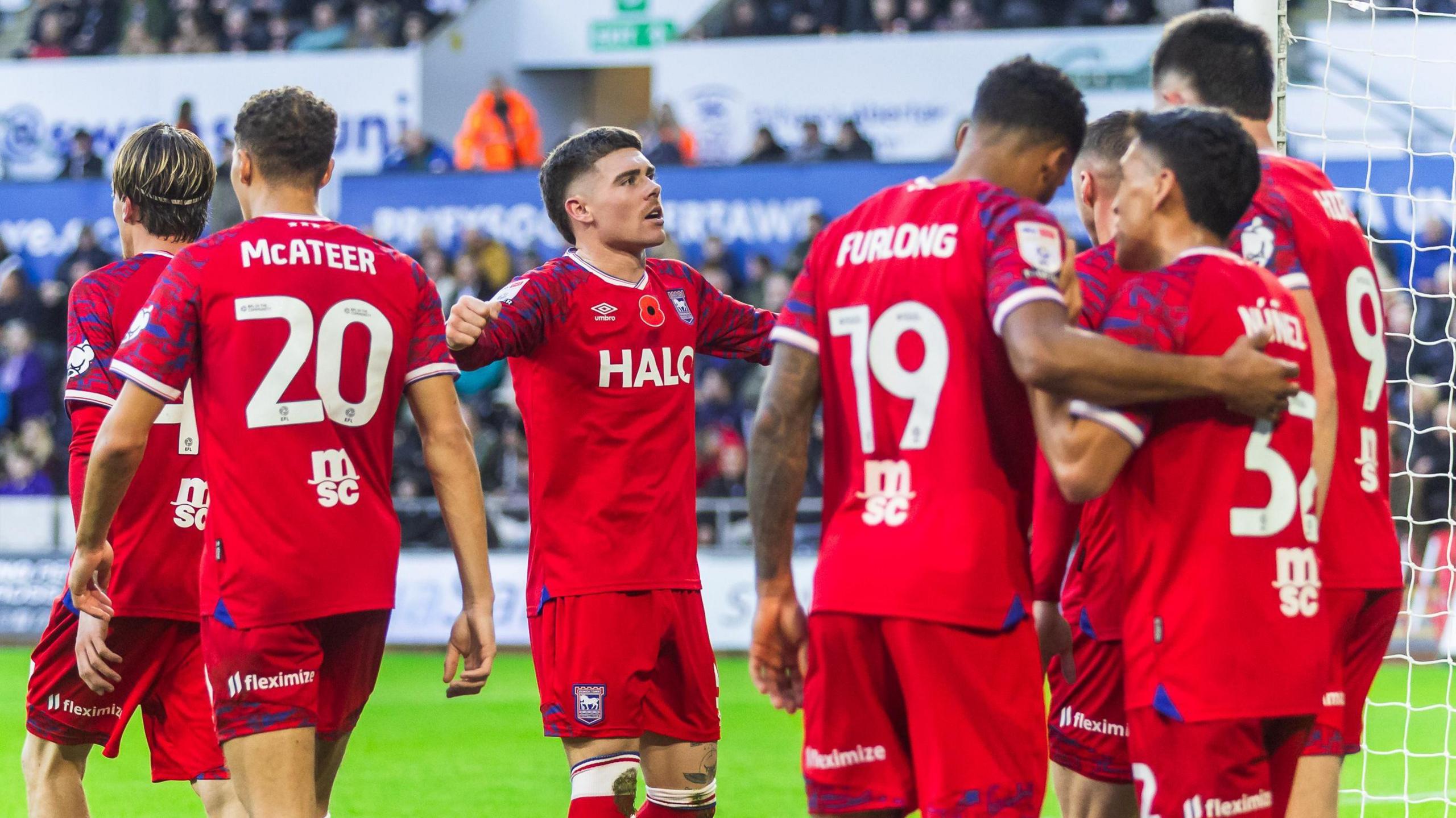 Leif Davis celebrates the first of Cameron Burgess' own goals