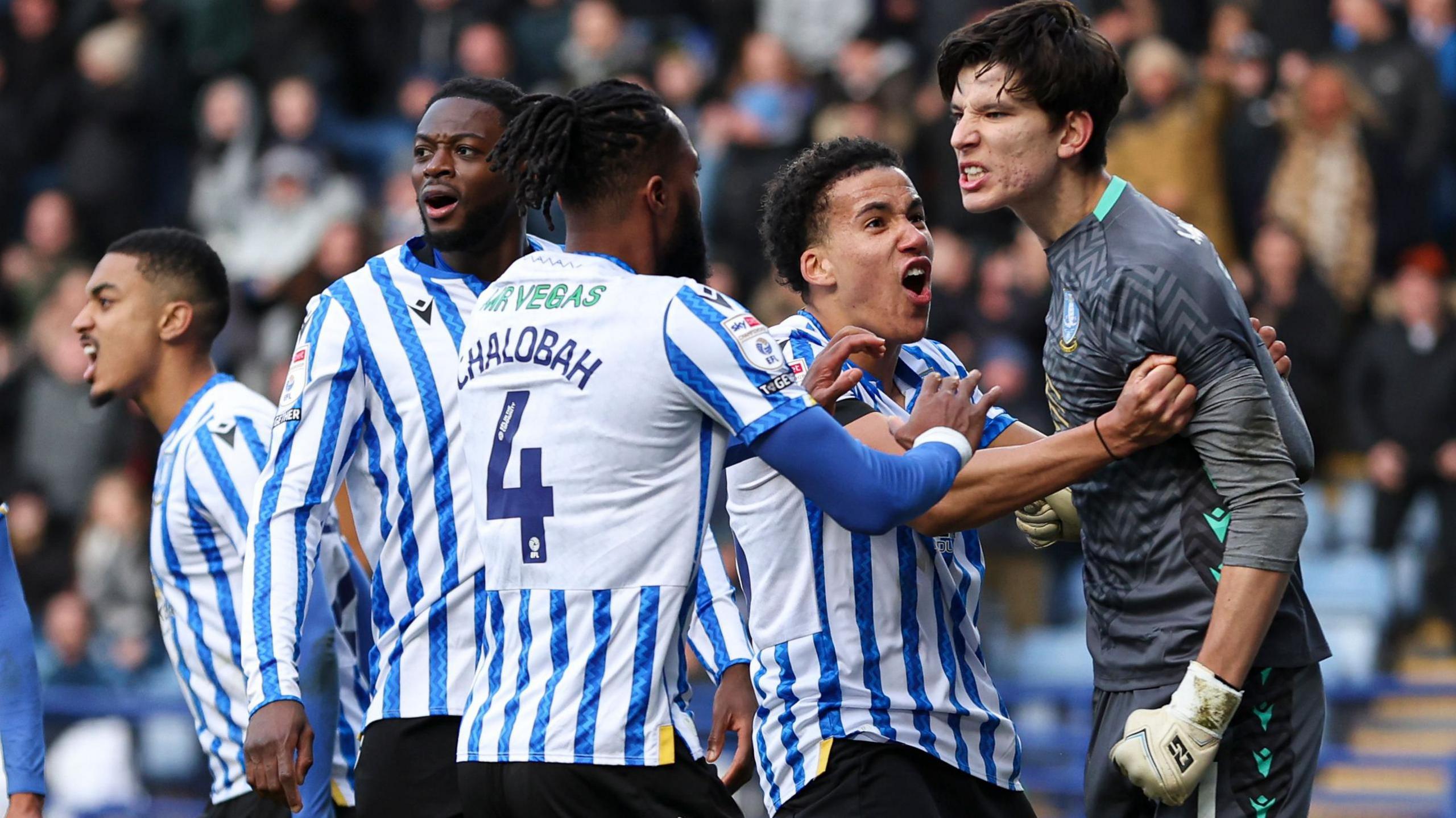 Sheffield Wednesday plays celebrate James Beadle's late penalty save