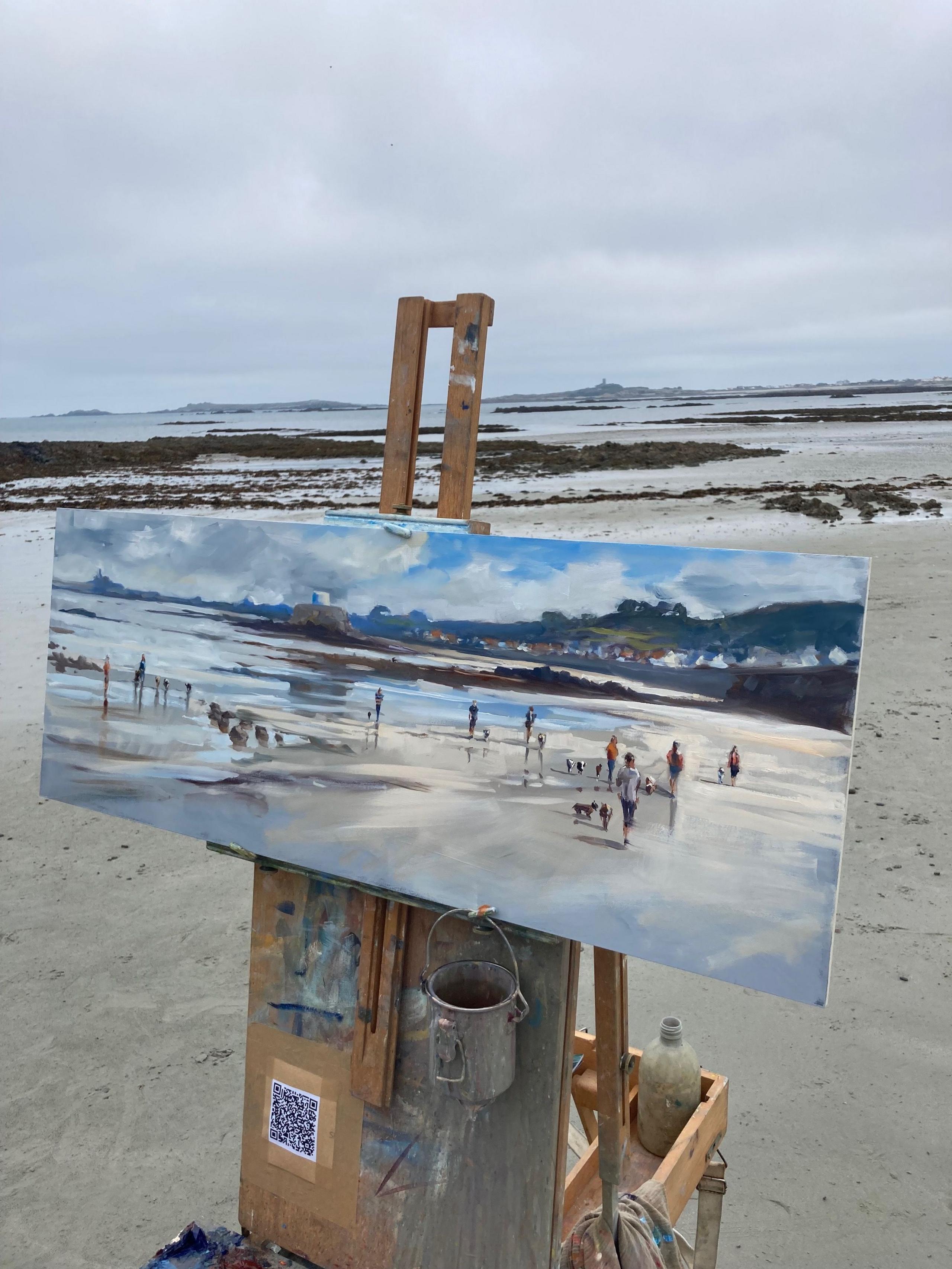 Painting on an easel at the beach