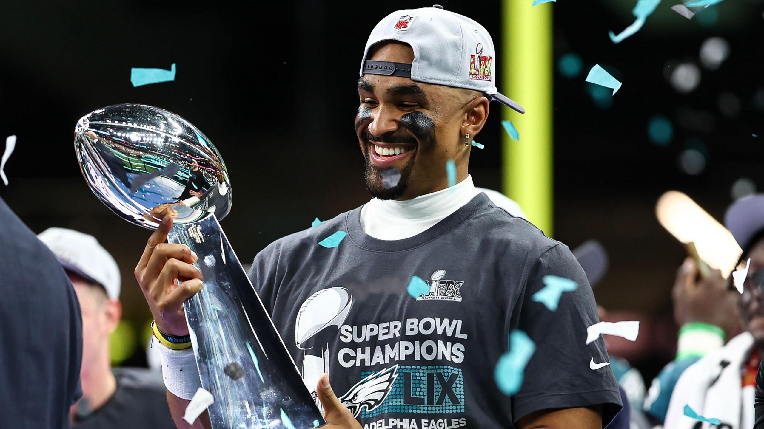 Philadelphia Eagles quarterback Jalen Hurts with the NFL Super Bowl trophy