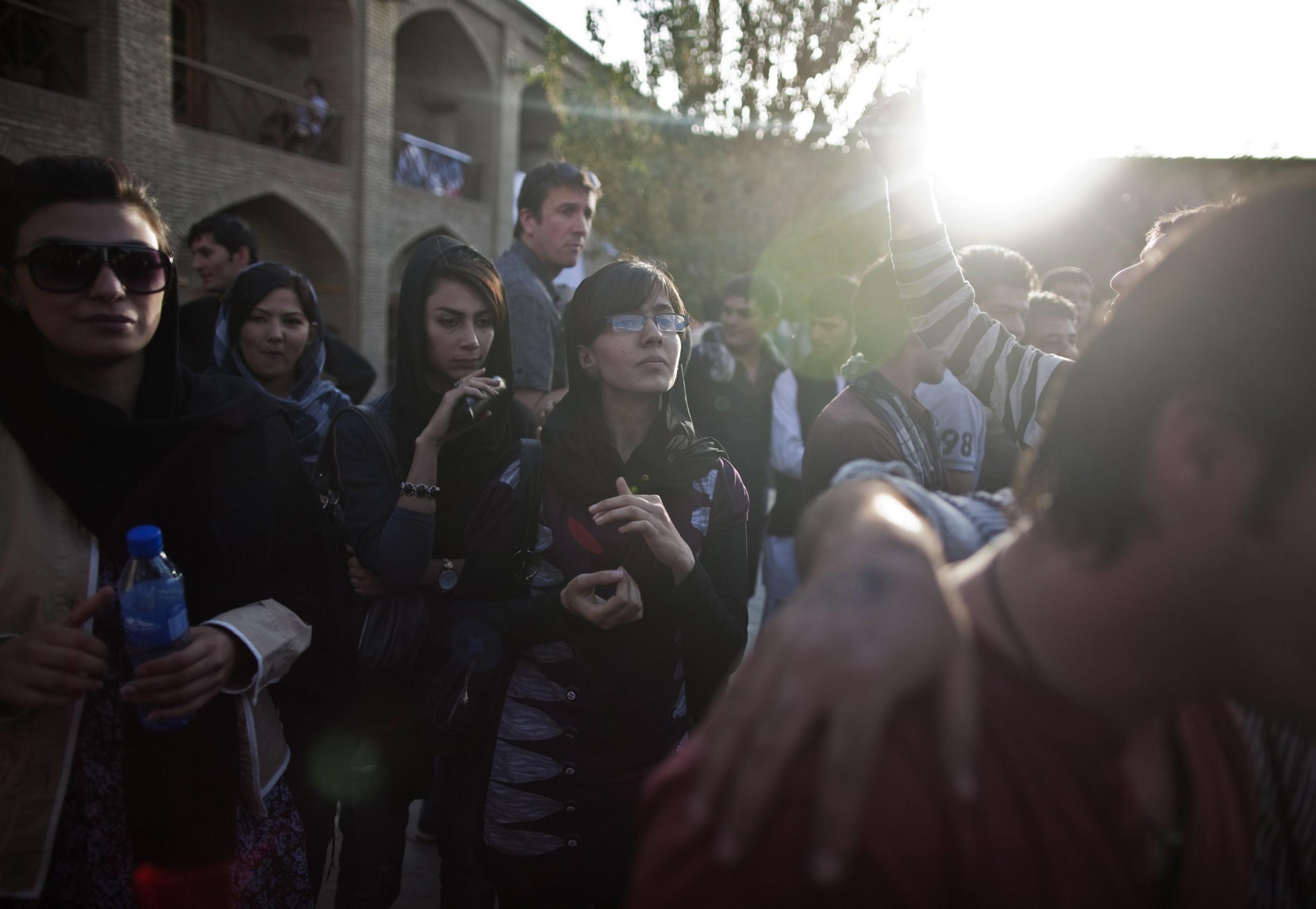 A group of young Afghans attend a music festival in Kabul