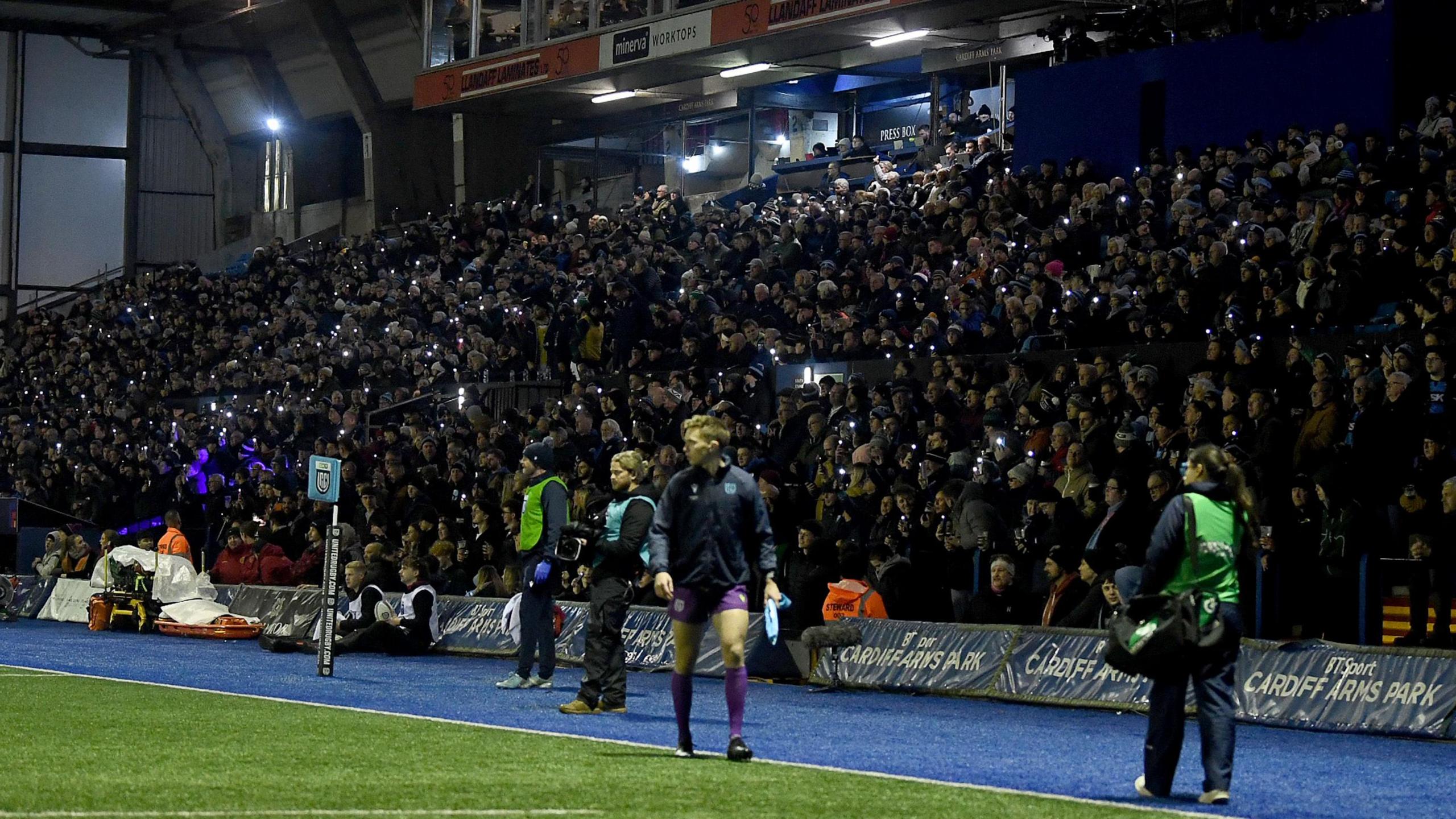 Cardiff fans shine their phone lights in protest in the 11th minute of the 17-8 win against Benetton