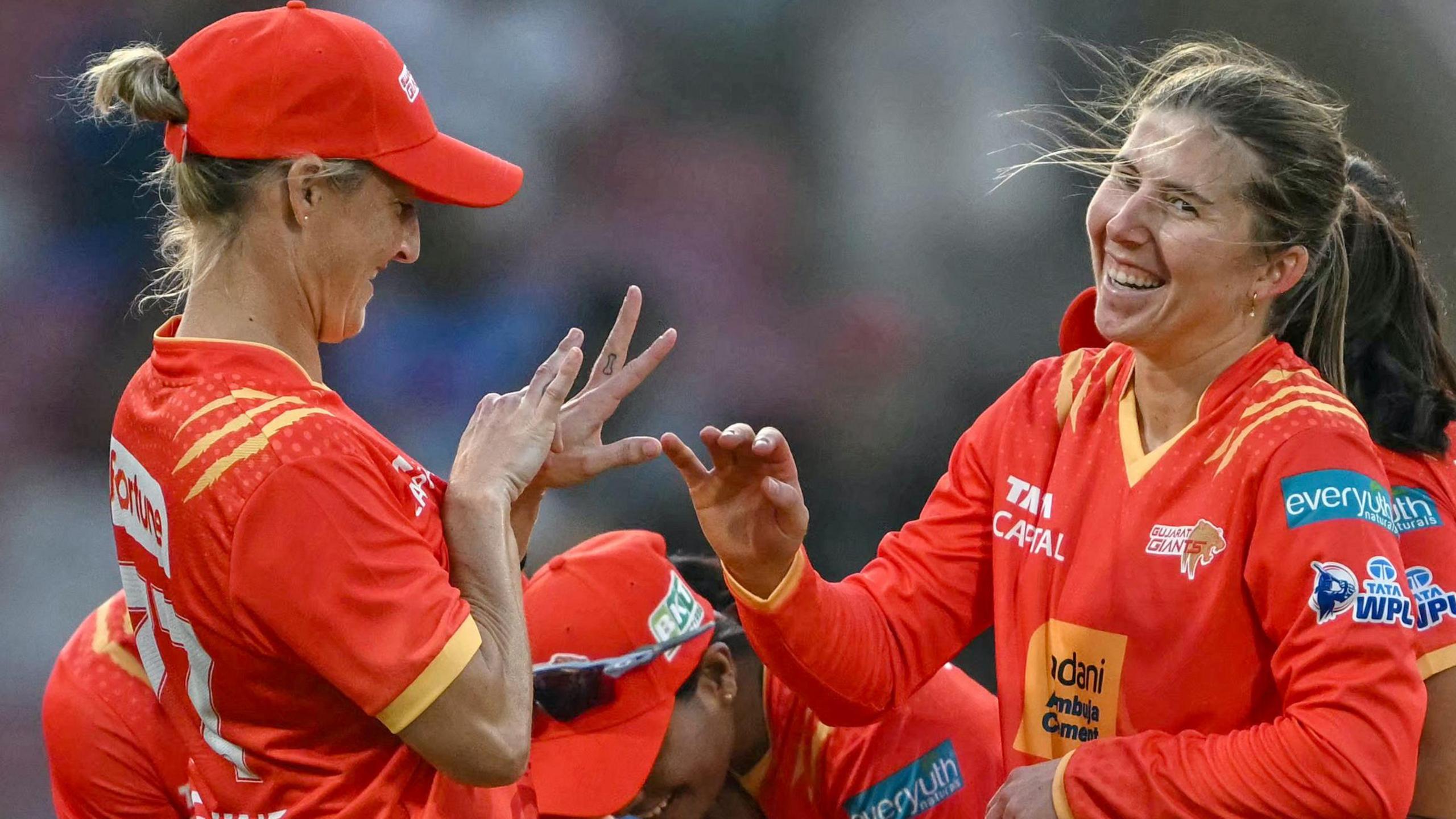 Georgia Wareham and Sophie Devine of Gujarat Giants celebrate a wicket 