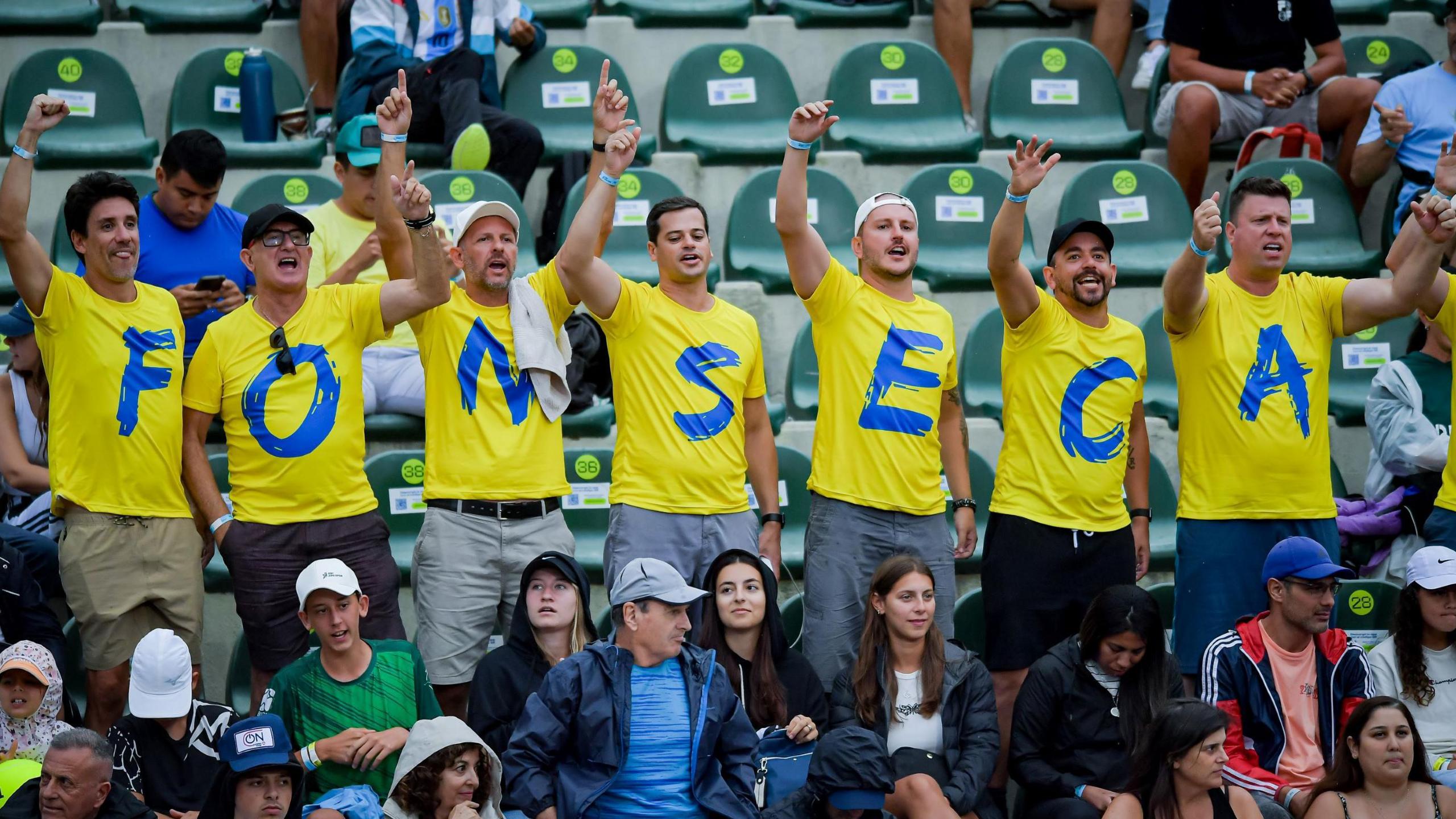 Brazilian fans wears T-shirts spelling out Fonseca's name