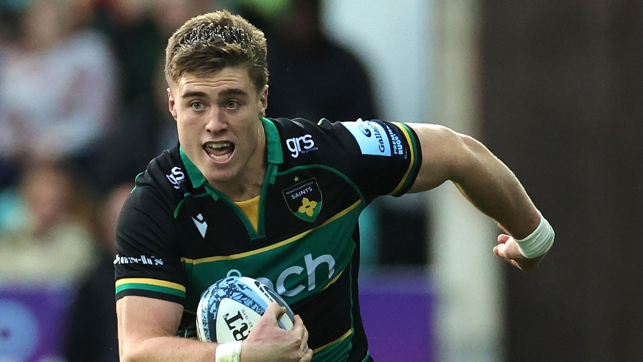 Tommy Freeman in action for Northampton Saints