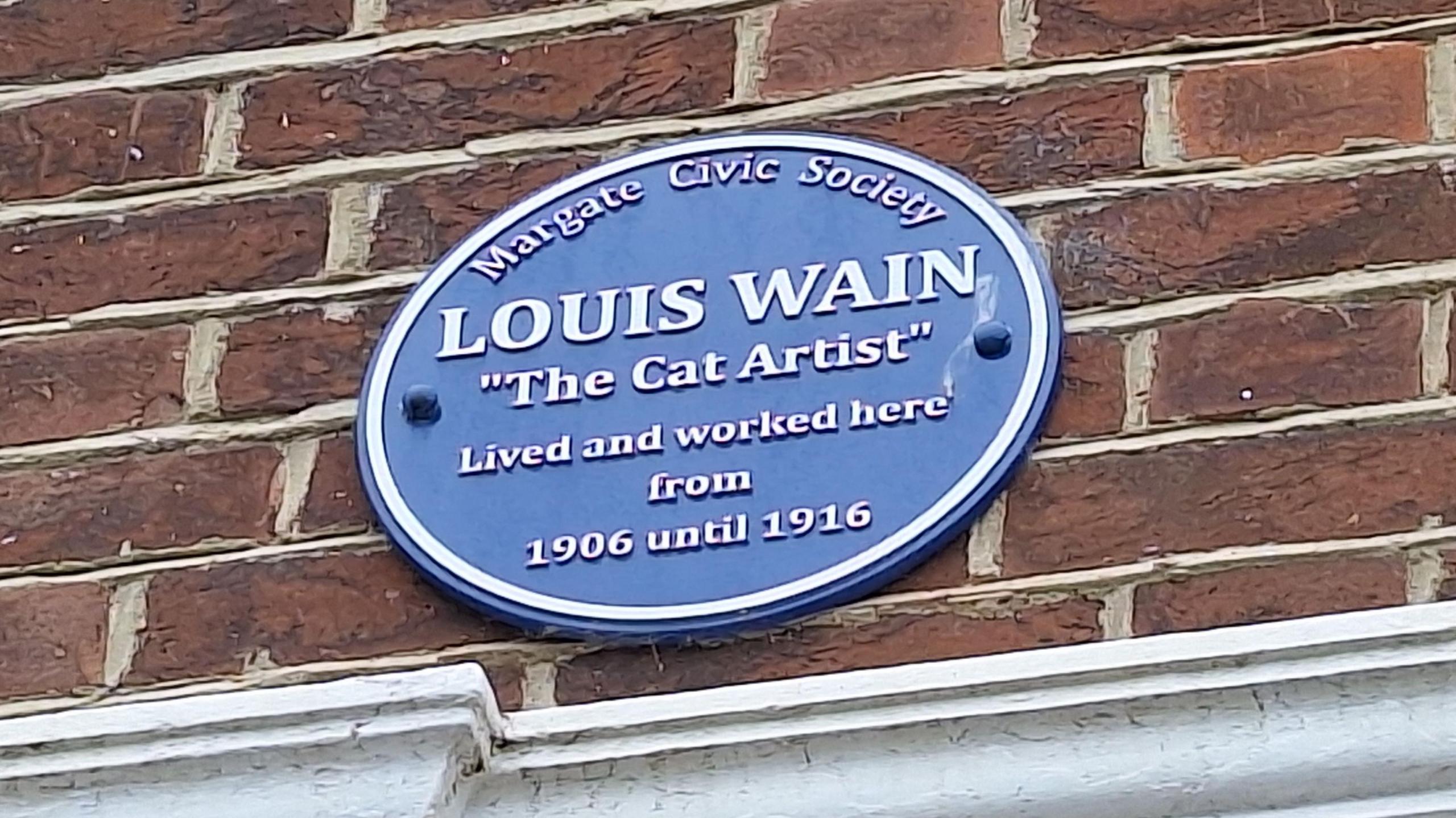 A blue plaque on a wall outside a house in Westgate which reads  Louis Wain - the cat artist - lived and worked here from 1906 to 1916 