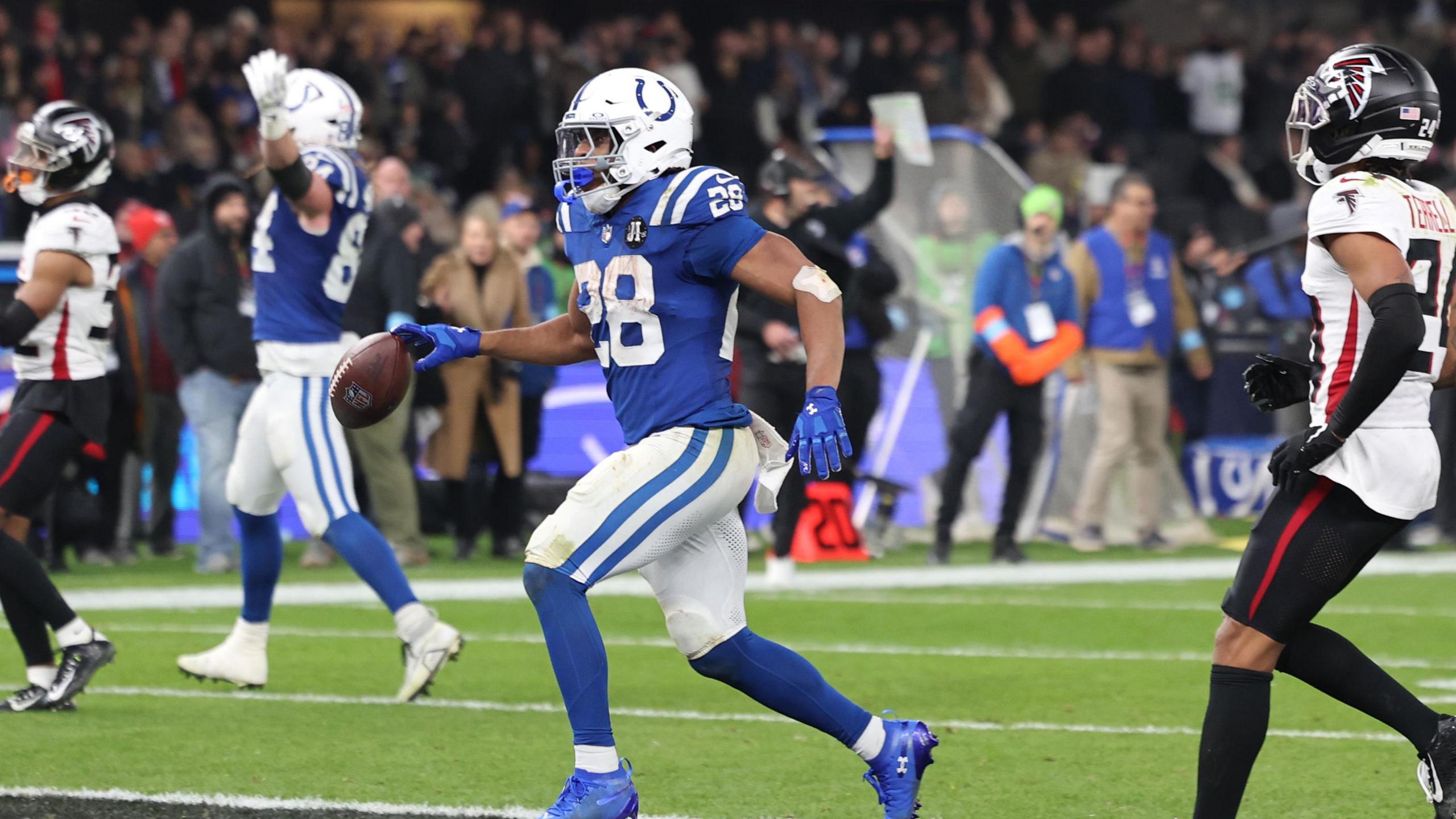 Jonathan Taylor of the Indianapolis Colts scores a touchdown against the Atlanta Falcons