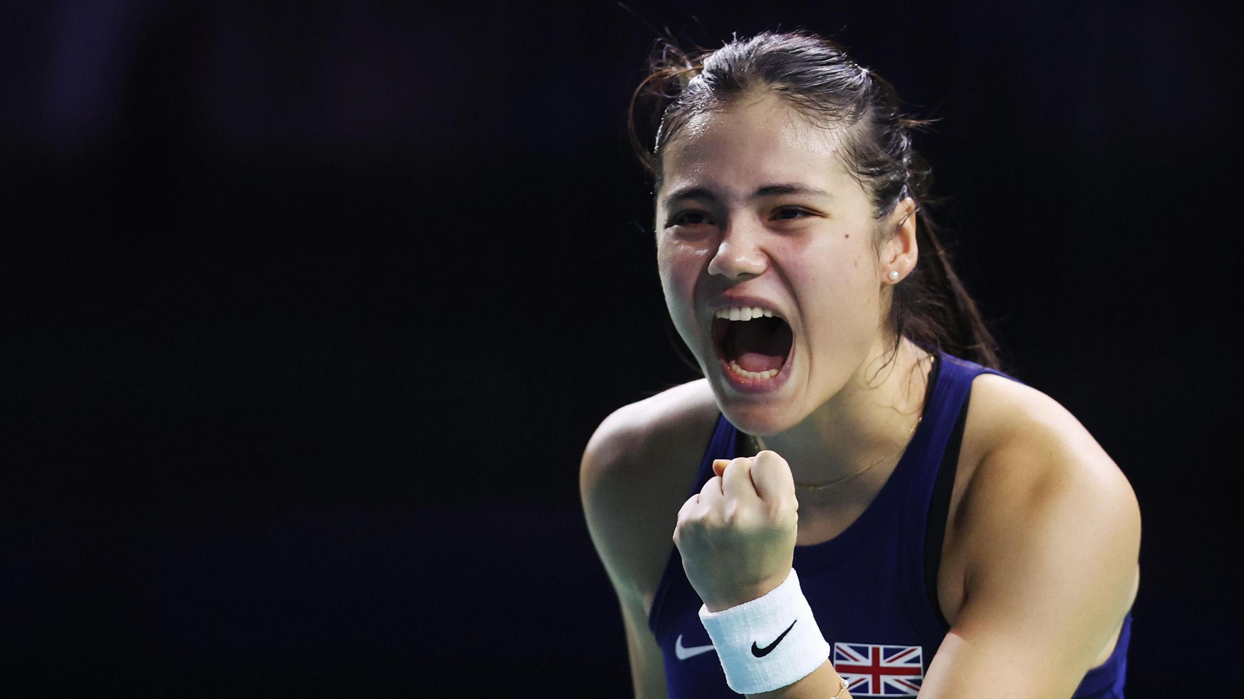 Emma Raducanu screams in celebration during her BJK Cup match against Slovakia's Viktoria Hruncakova