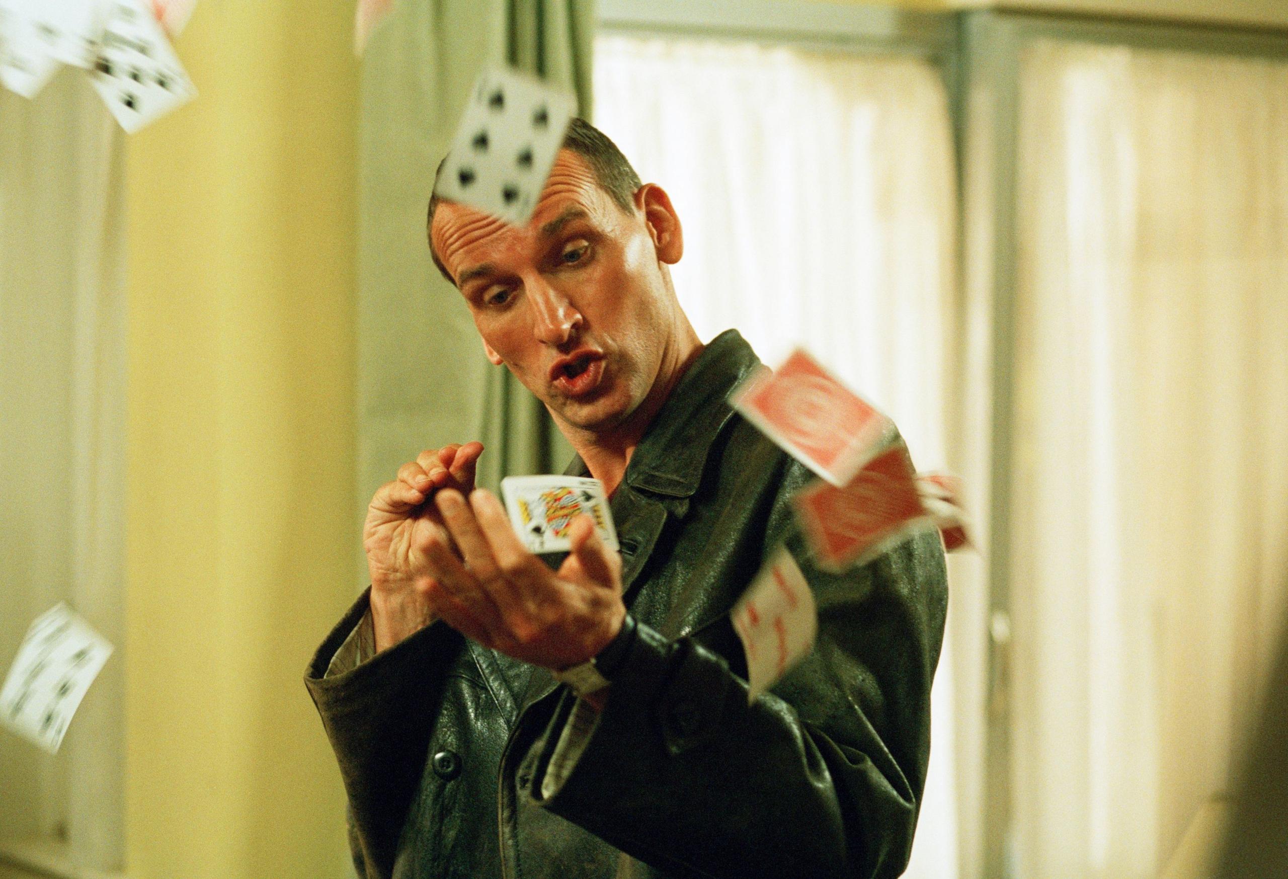 Christopher Eccleston (The Ninth Doctor) practising his card tricks in Rose (2005)