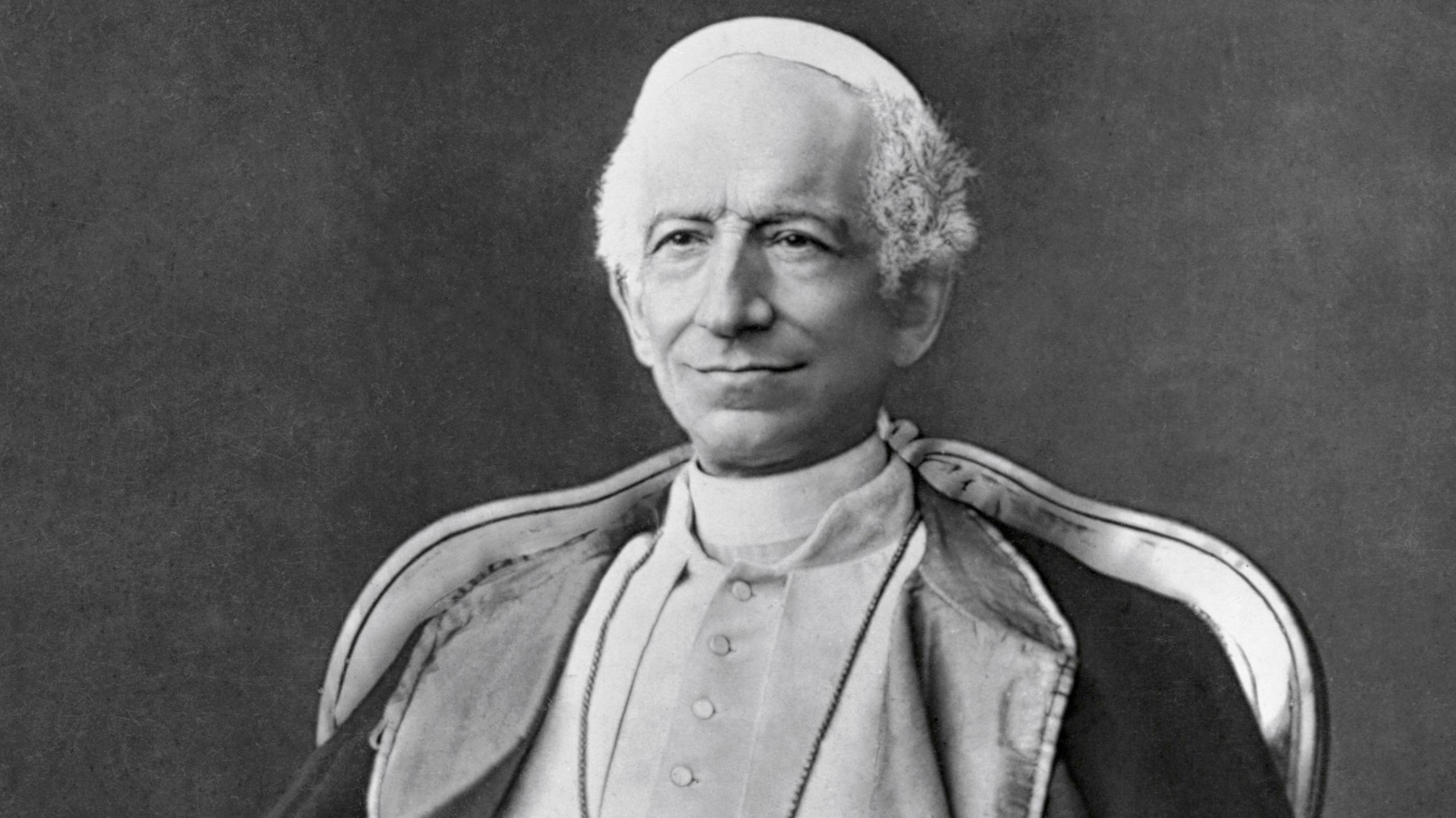 Pope Leo XIII sitting in a chair