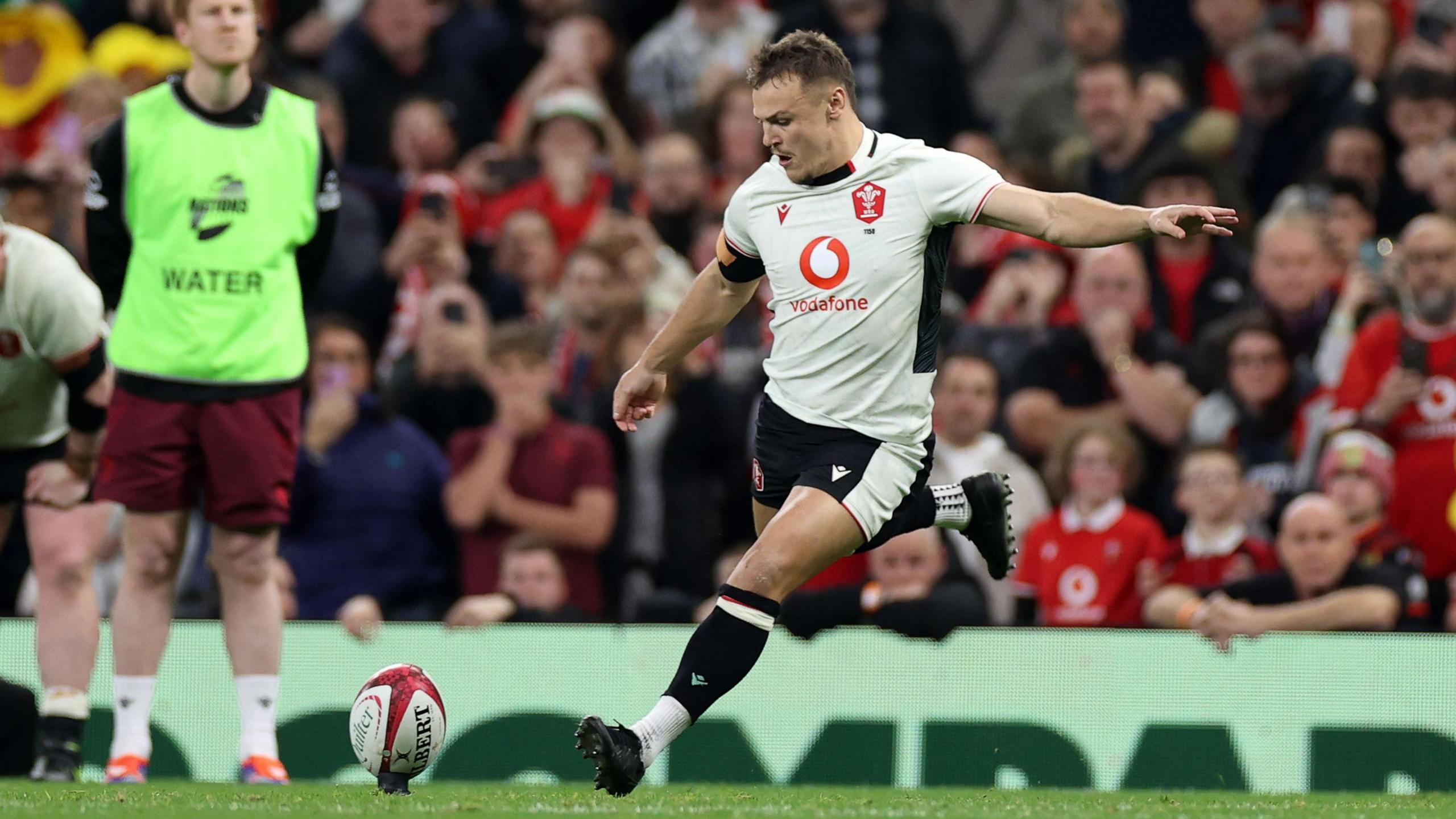 Jarrod Evans kicks his match-winning penalty for Wales against Japan