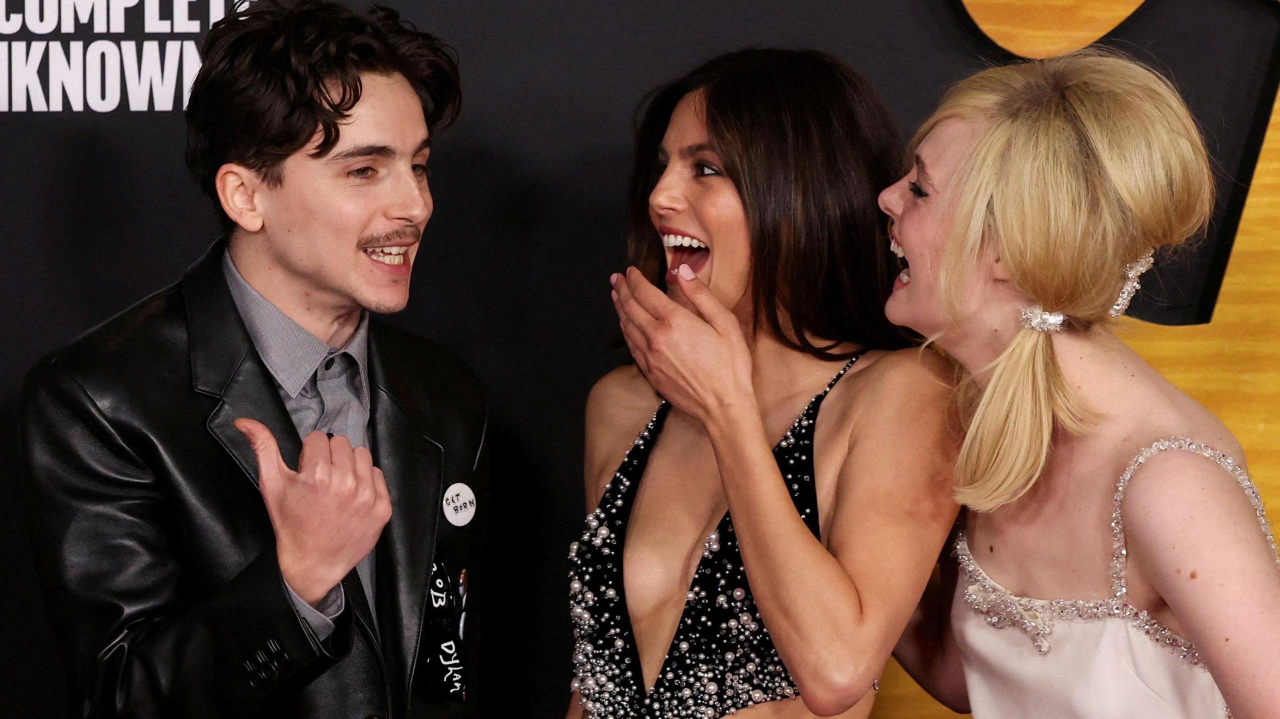 Timothee Chalamet, Monica Barbaro and Elle Fanning attend a premiere of the film "A Complete Unknown" at Dolby Theatre in Los Angeles, California, U.S. December 10, 2024