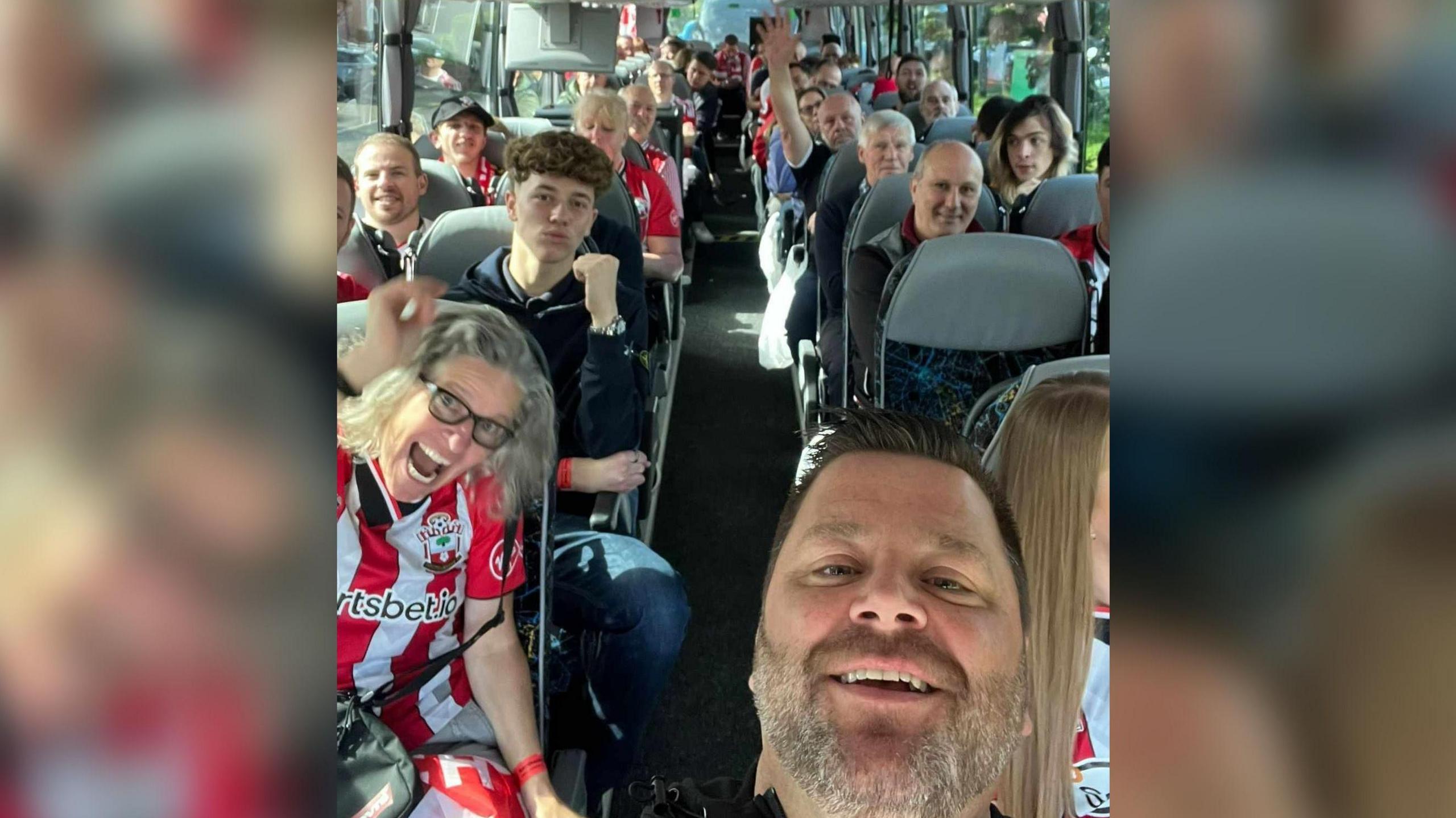 Saints fans on a bus