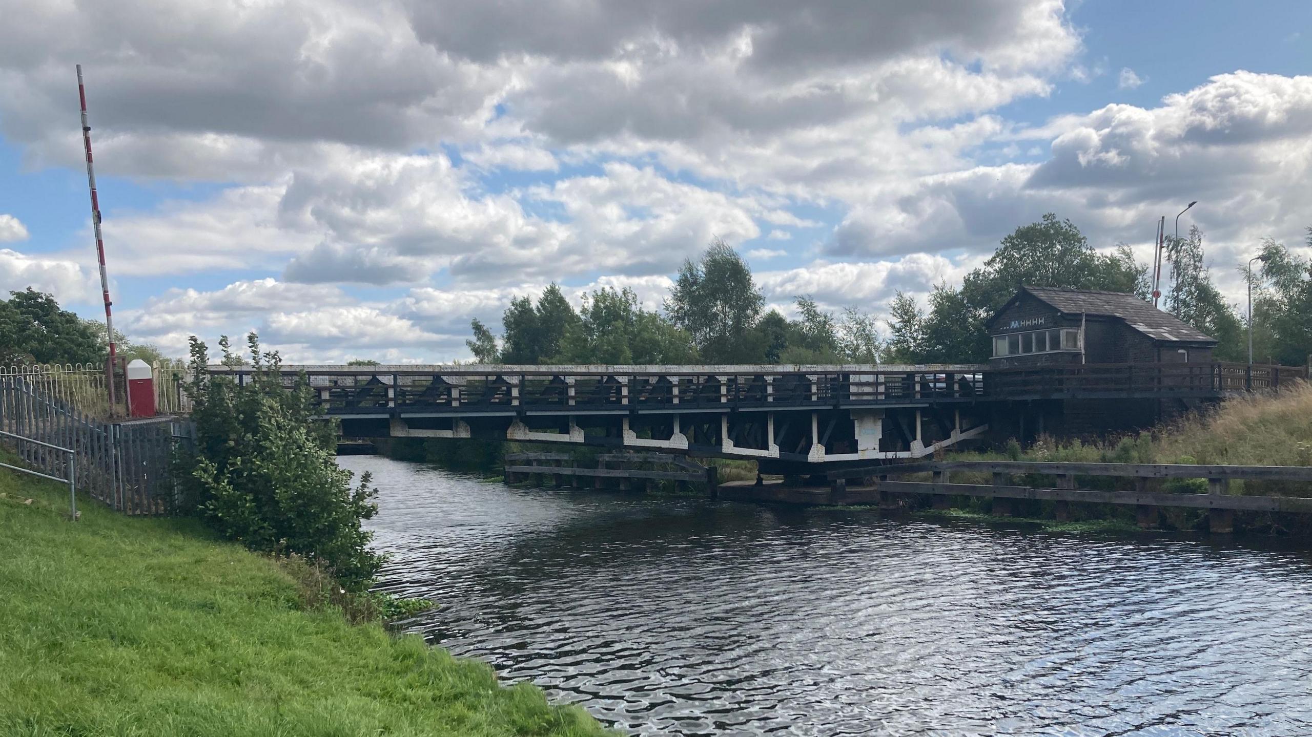 A view of the grade II-listed Winnington Swing bridge over the river Weaver in Northwich, Cheshire