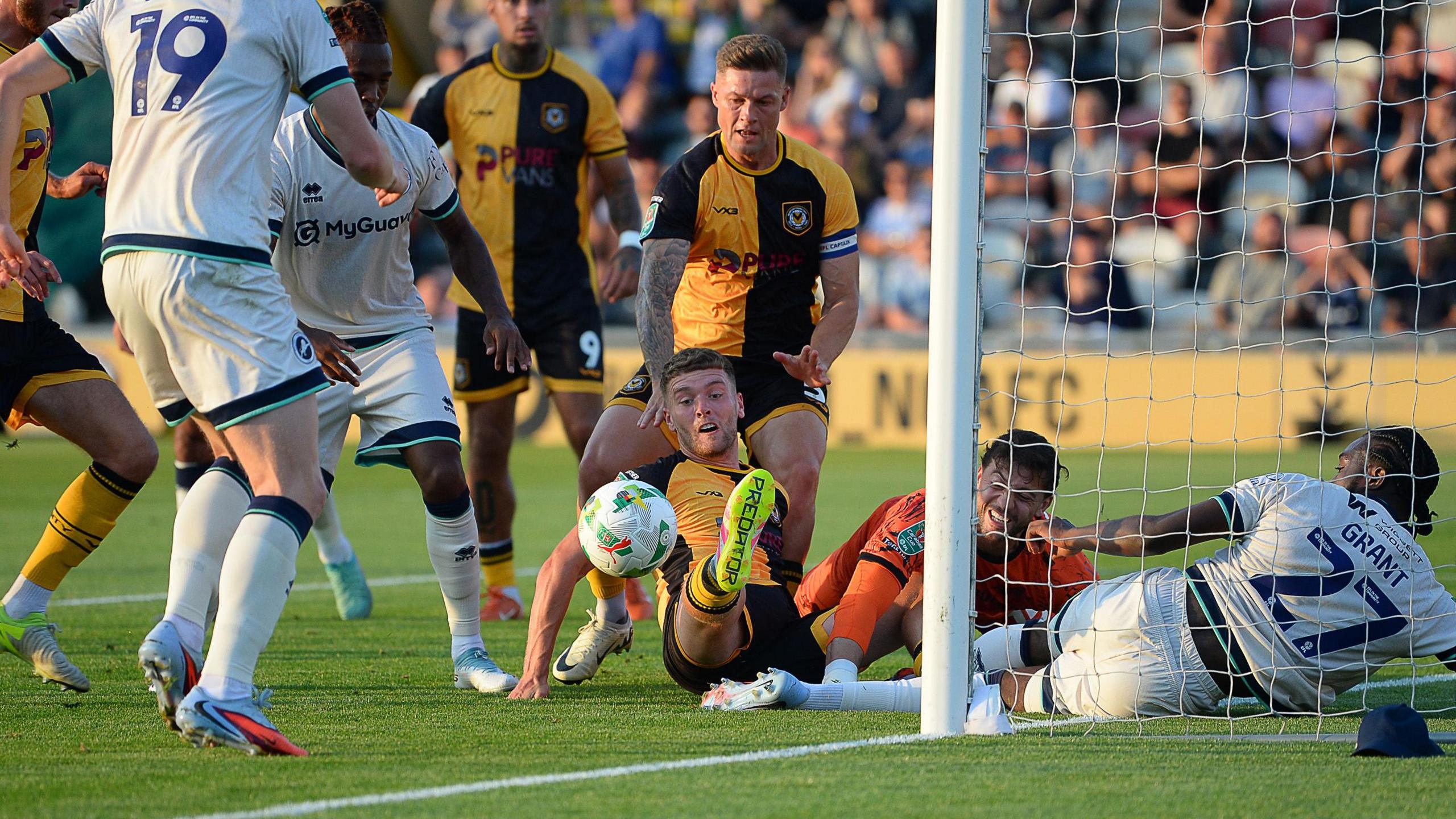 Newport County are denied an opener against Millwall after a goalmouth scramble at Rodney Parade
