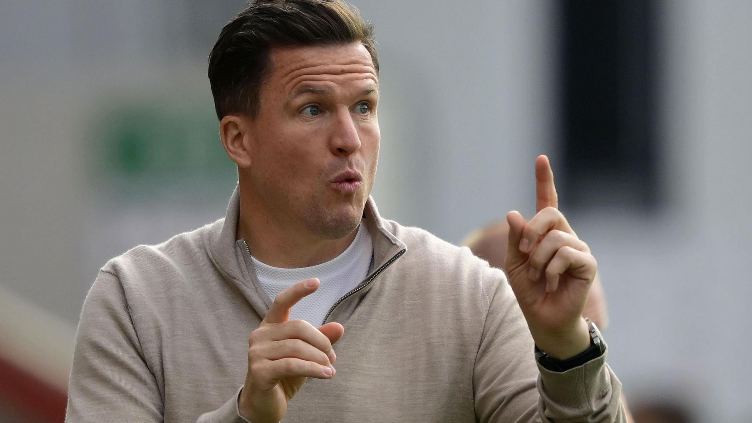 Exeter City boss Gary Caldwell on the sidelines