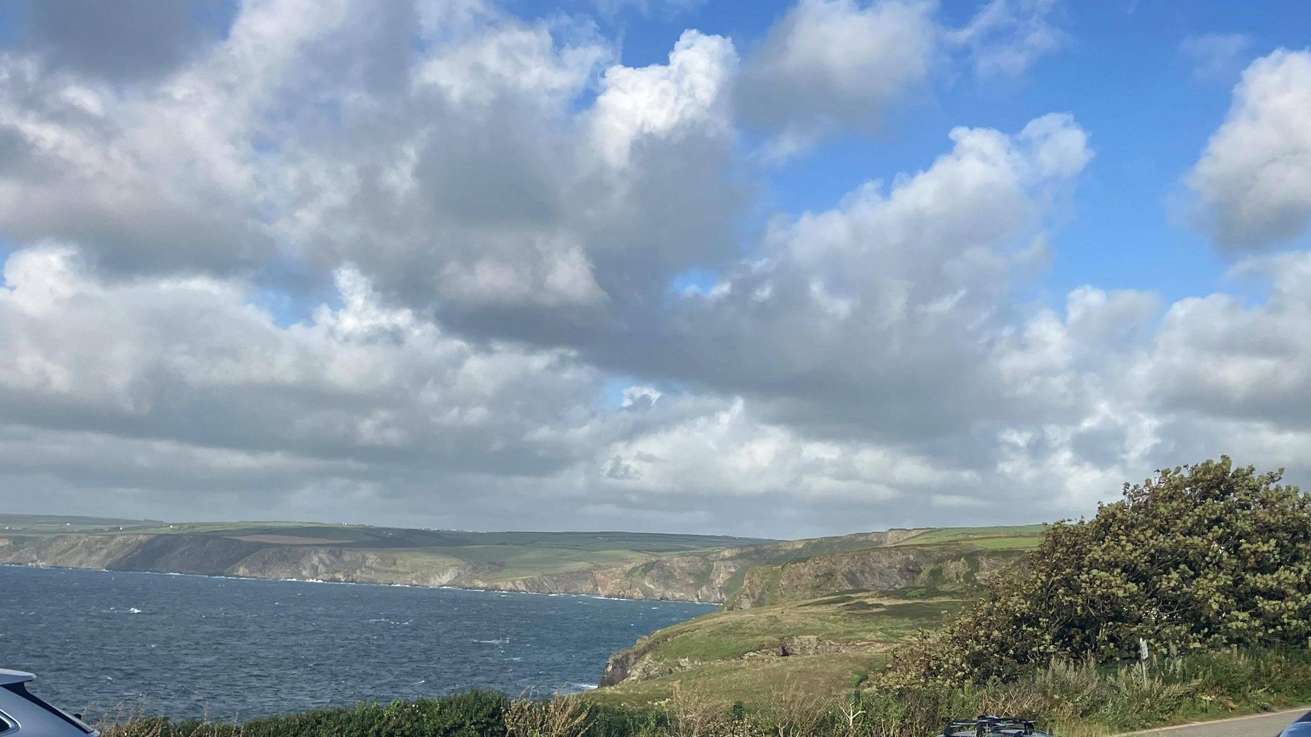 View over Port Isaac Bay showing the cliffs and the sea