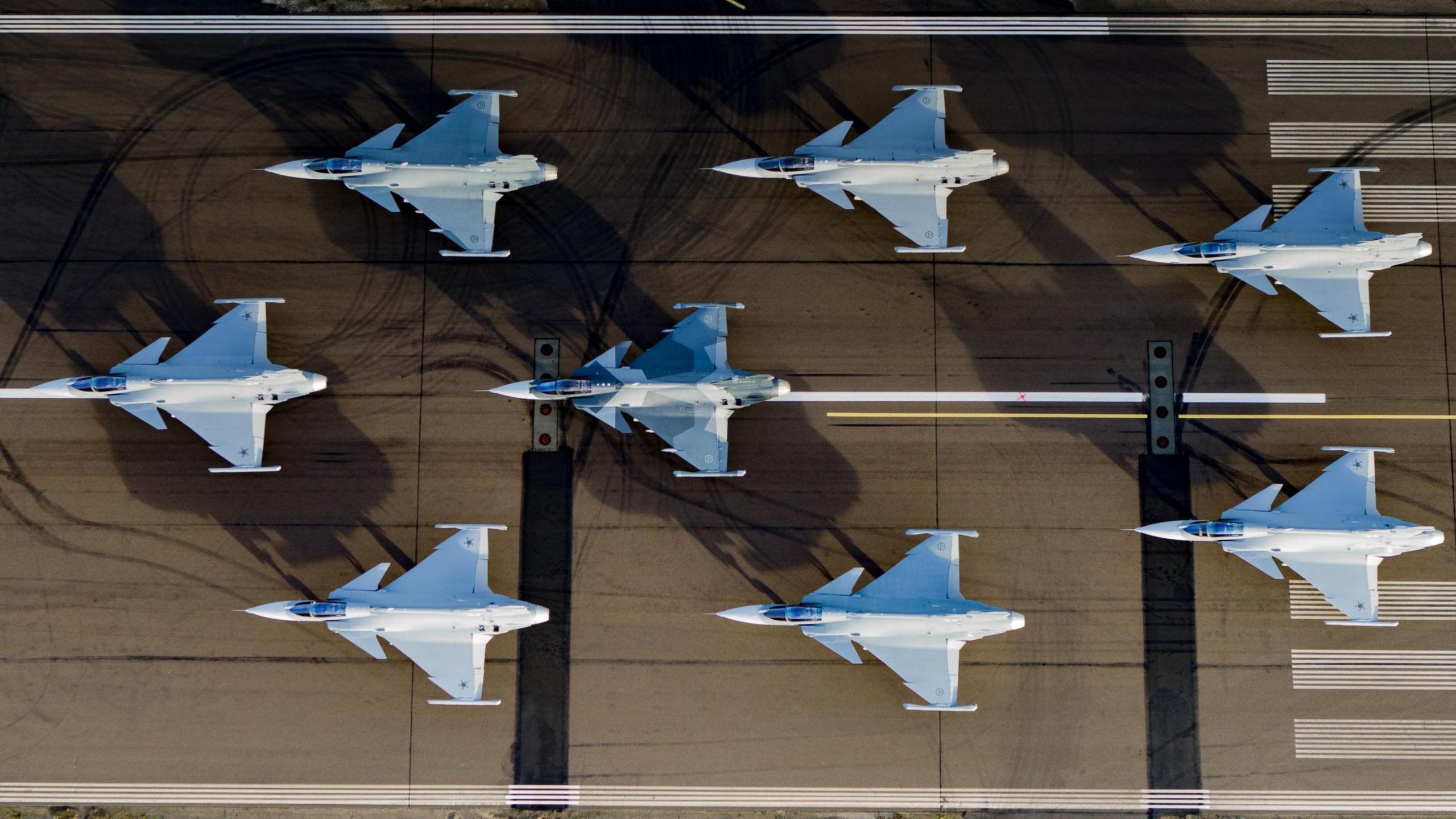 Saab Gripen fighter jets on a runway