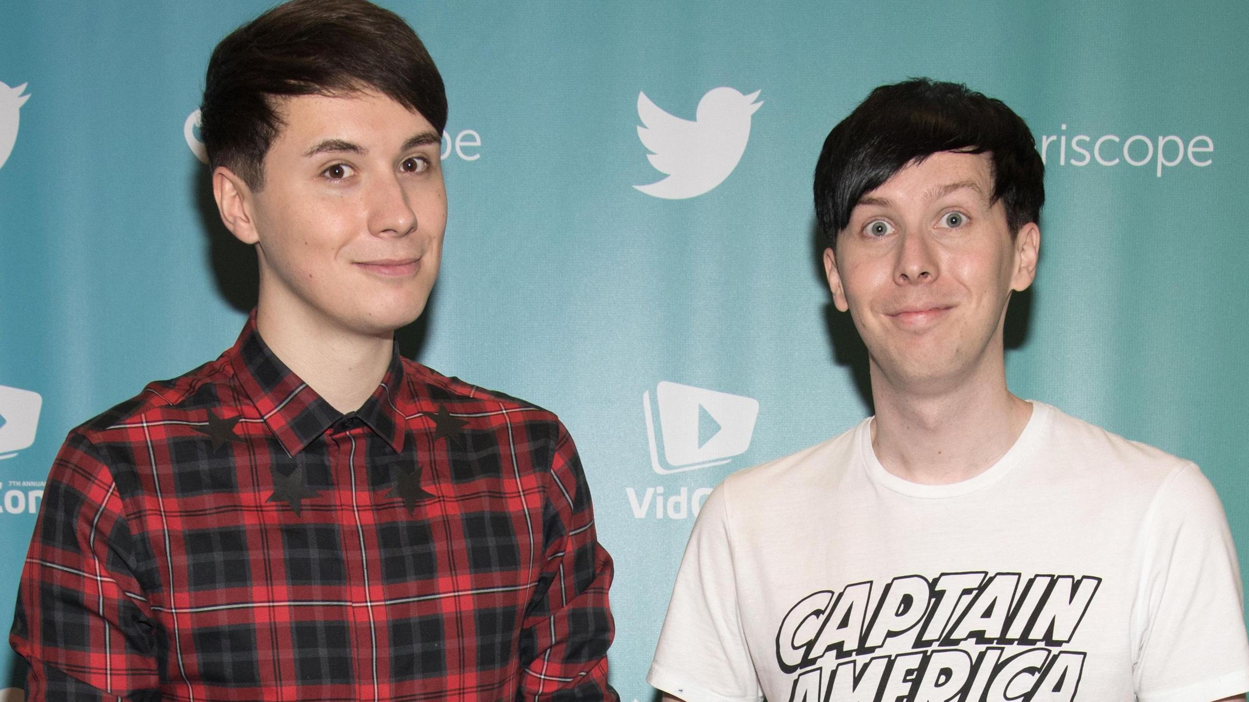 Dan and Phil posing together at Vidcon in 2016