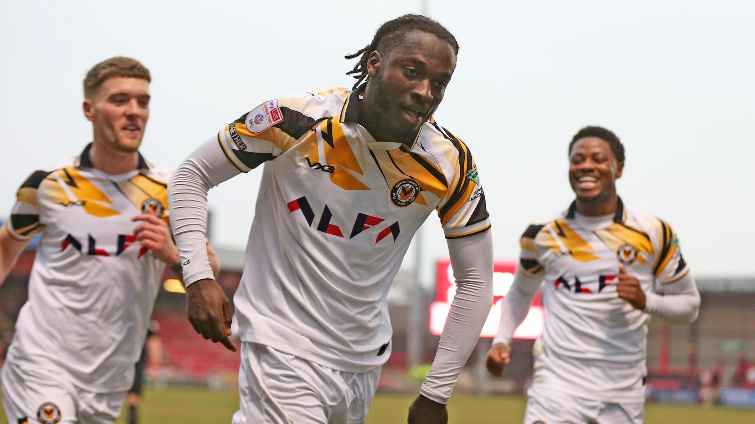 Cameron Antwi celebrates after giving Newport the lead at Crewe