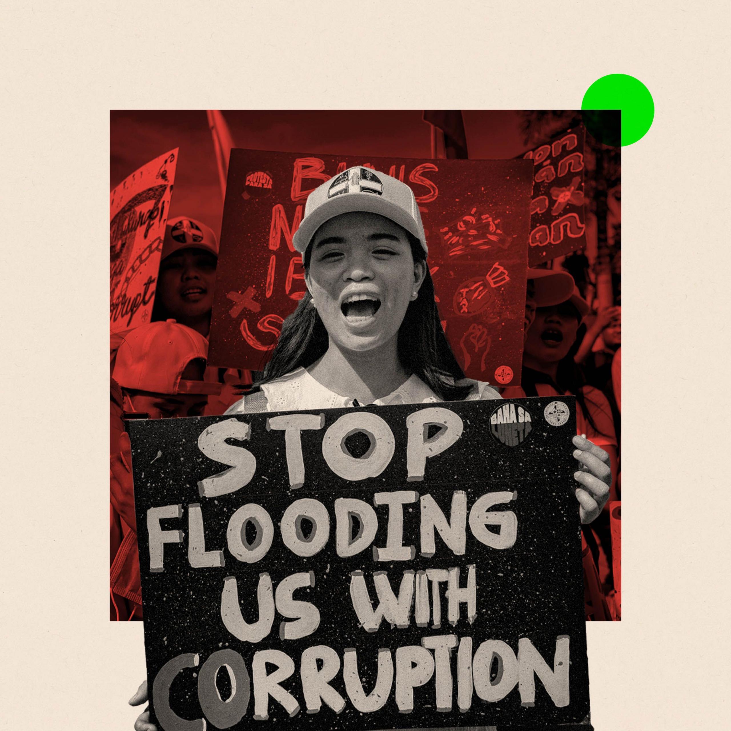 Protester holding an anti-corruption sign