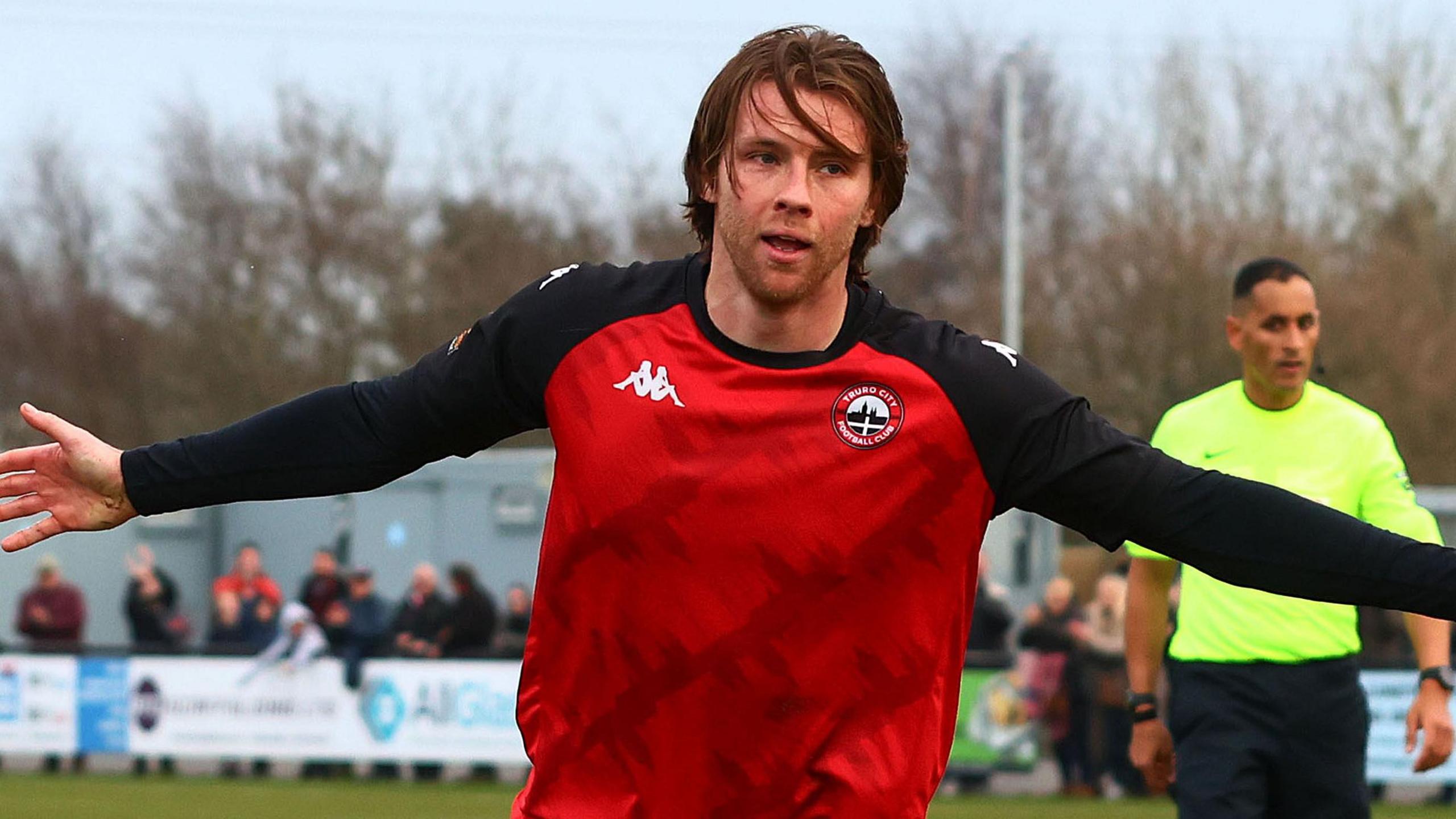 Tyler Harvey celebrates scoring for Truro City