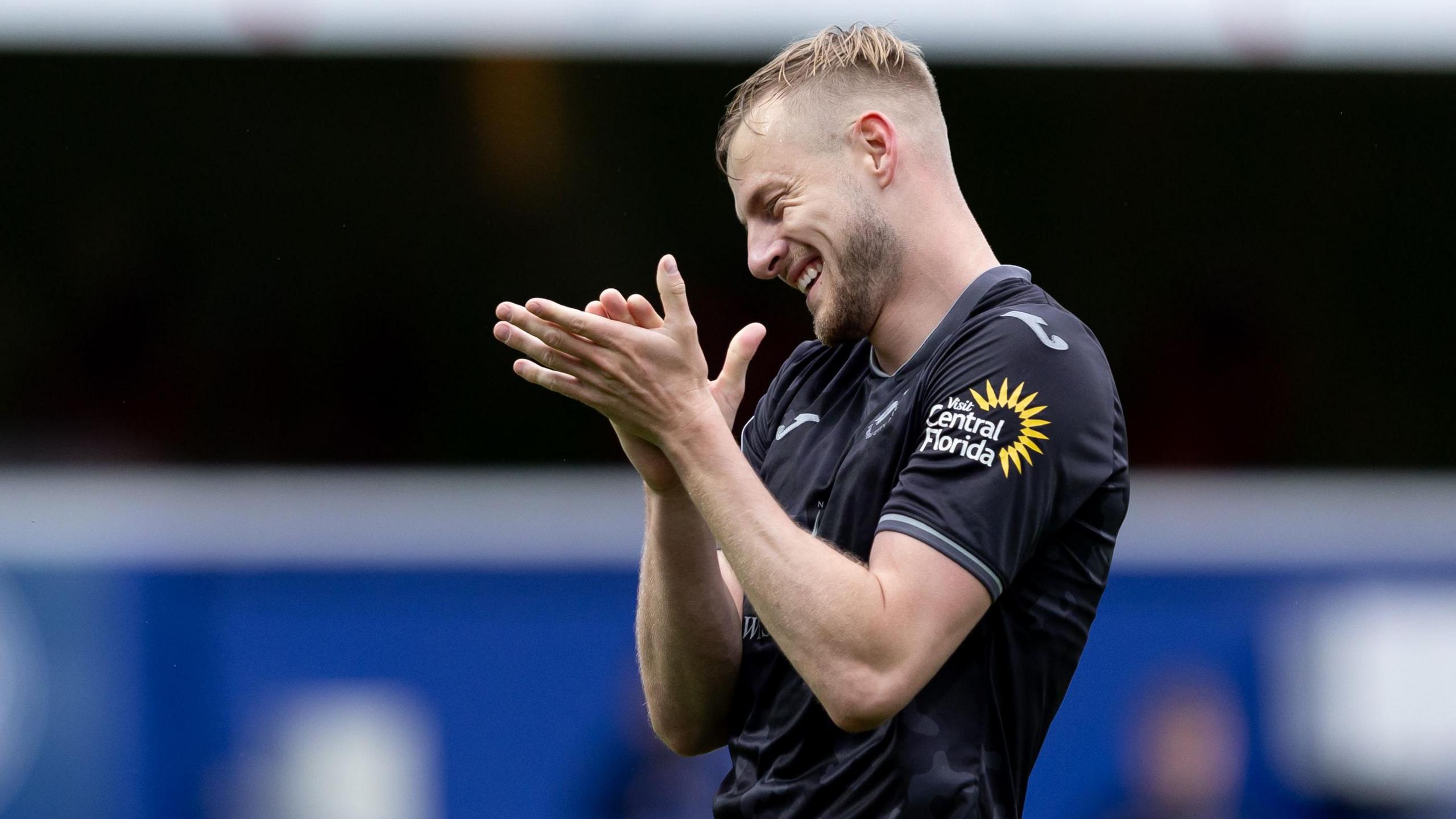 Harry Darling in action for Swansea last season