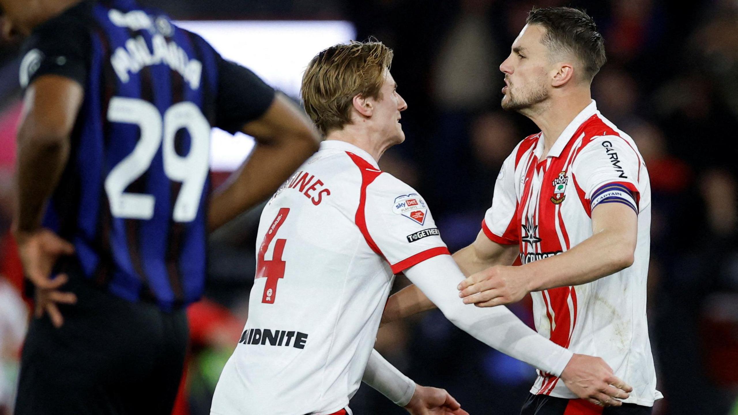 Southampton players are seen hugging during their game against Middlesbrough on 12 May 2026.