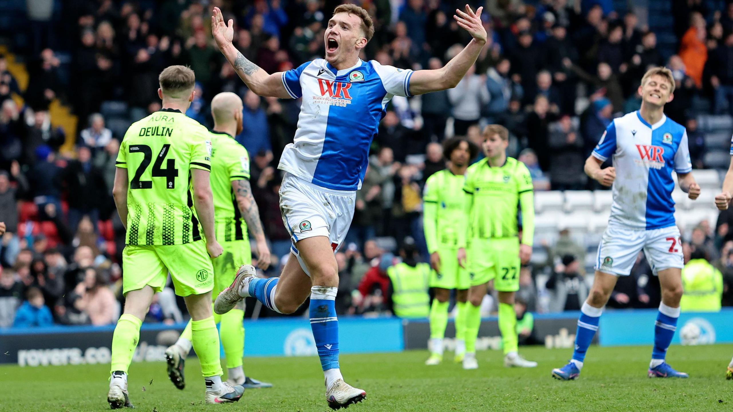 Hayden Carter celebrates scoring a late equaliser for Blackburn against Portsmouth