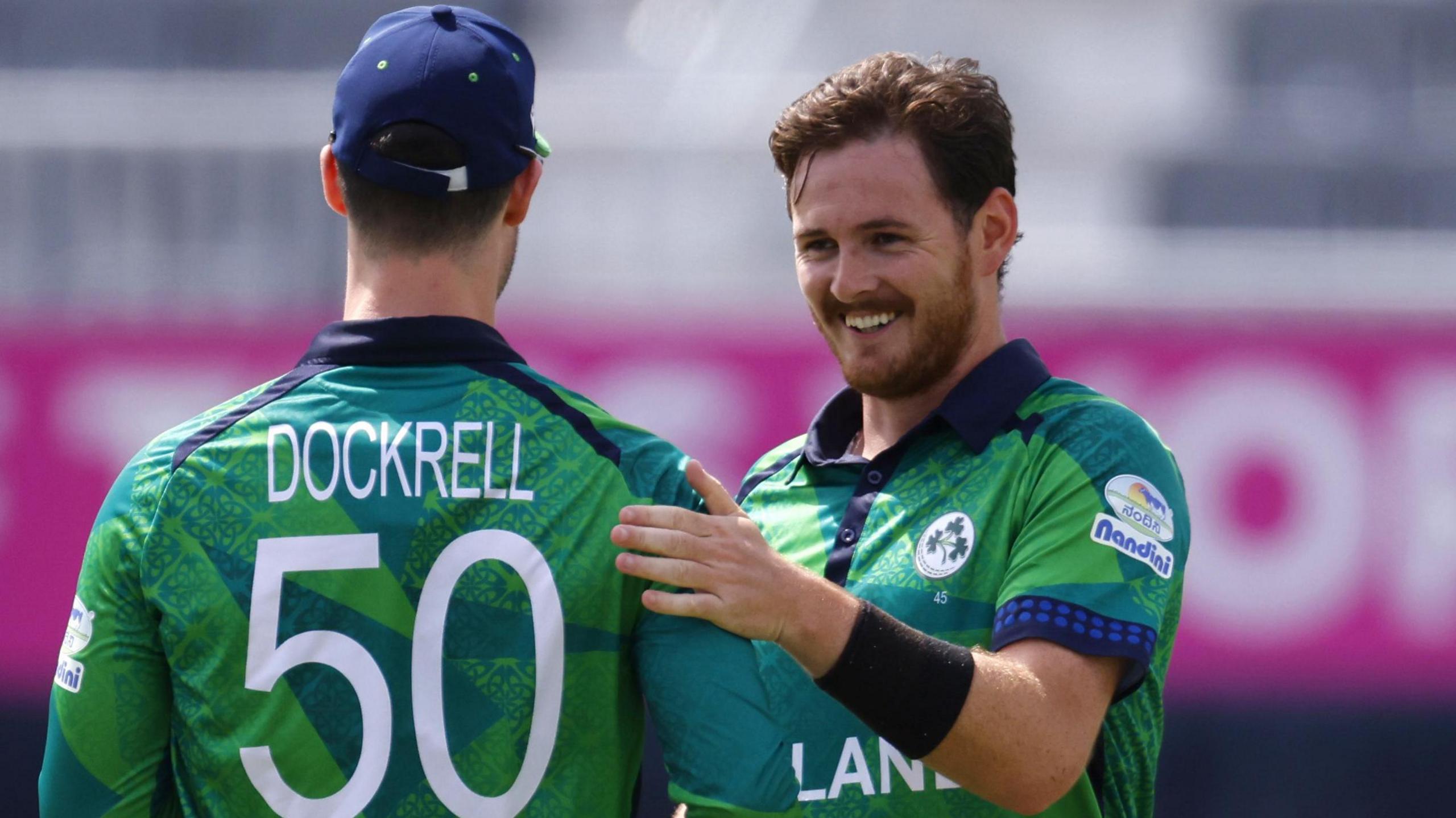 Mark Adair (right) celebrates a wicket with Ireland team-mate George Dockrell