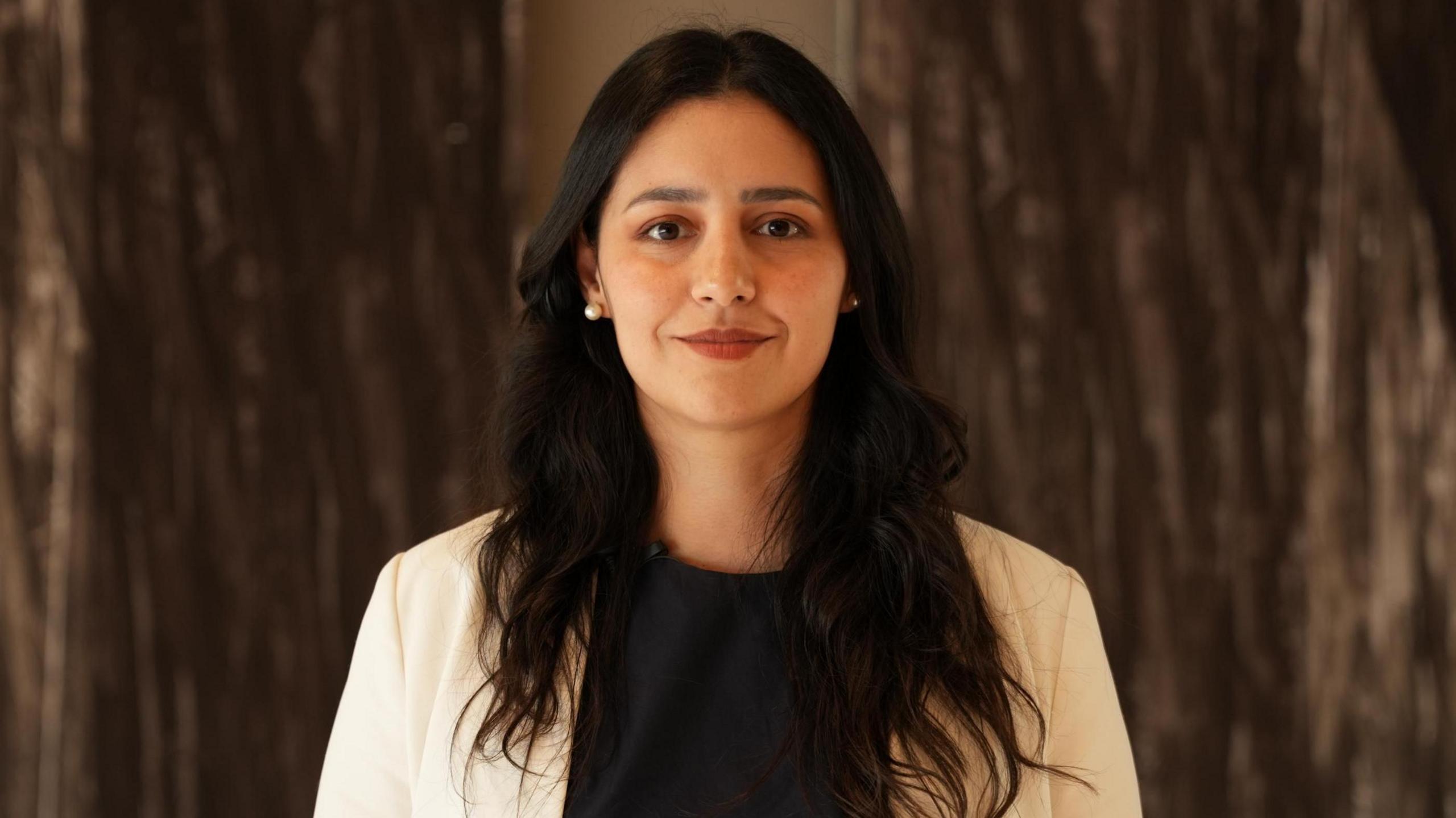 Vanessa Cañete looks at the camera