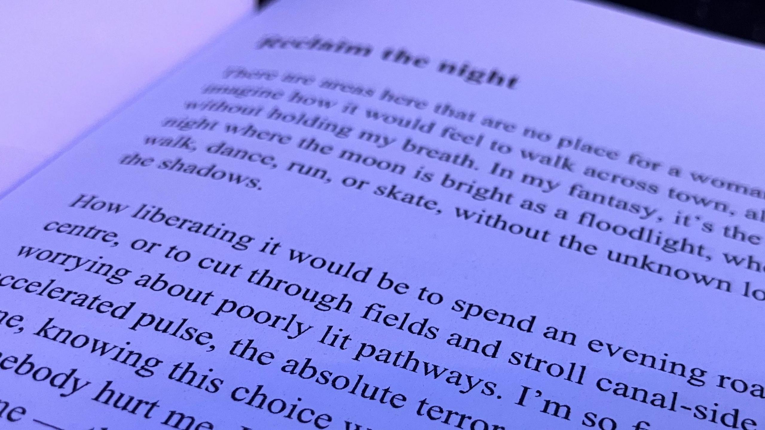 Close-up image of text on a page of a book; the main line visible says, "How liberating it would be to spend an evening..." 