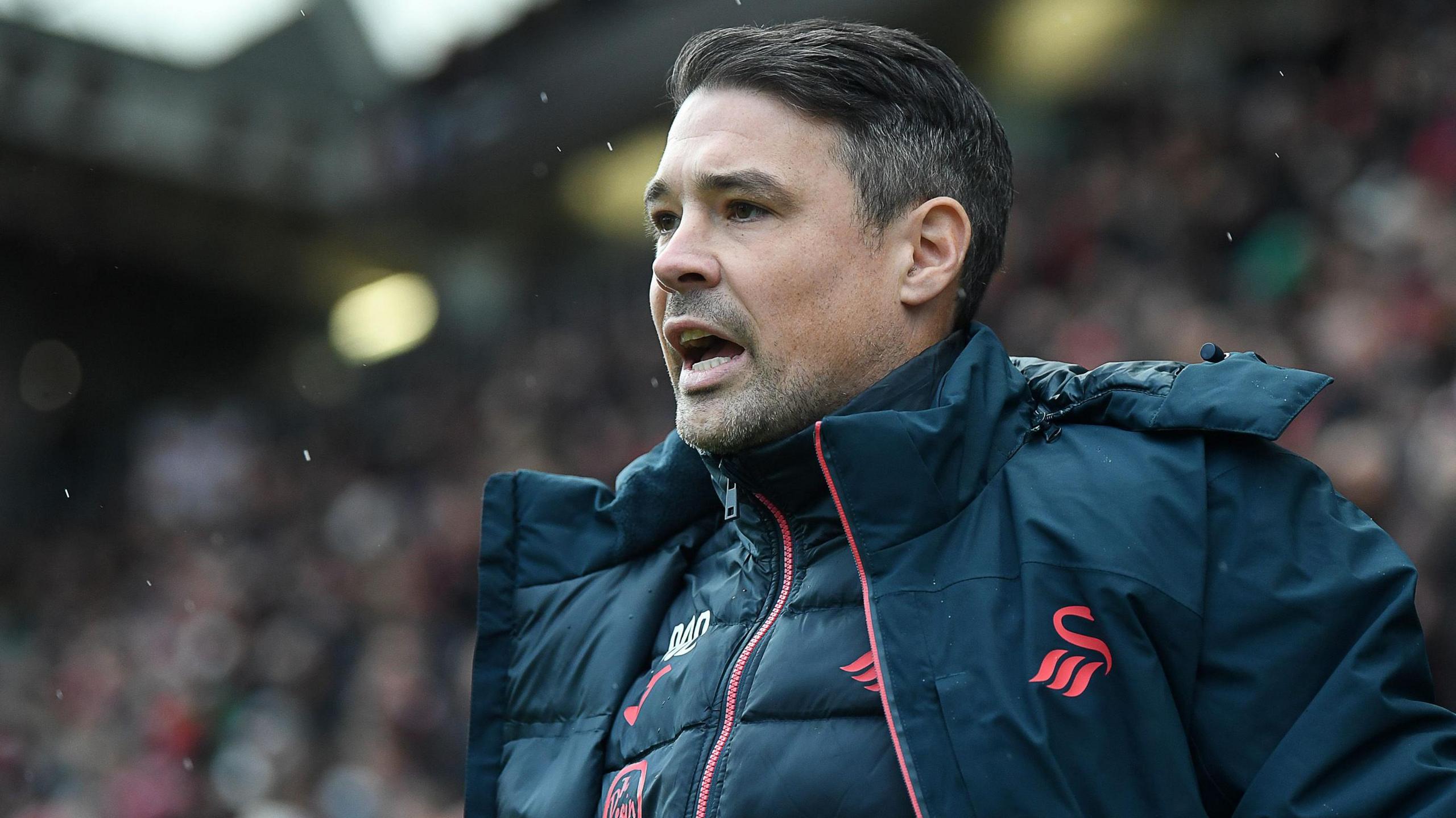 Darren O'Dea shouts instructions to Swansea players