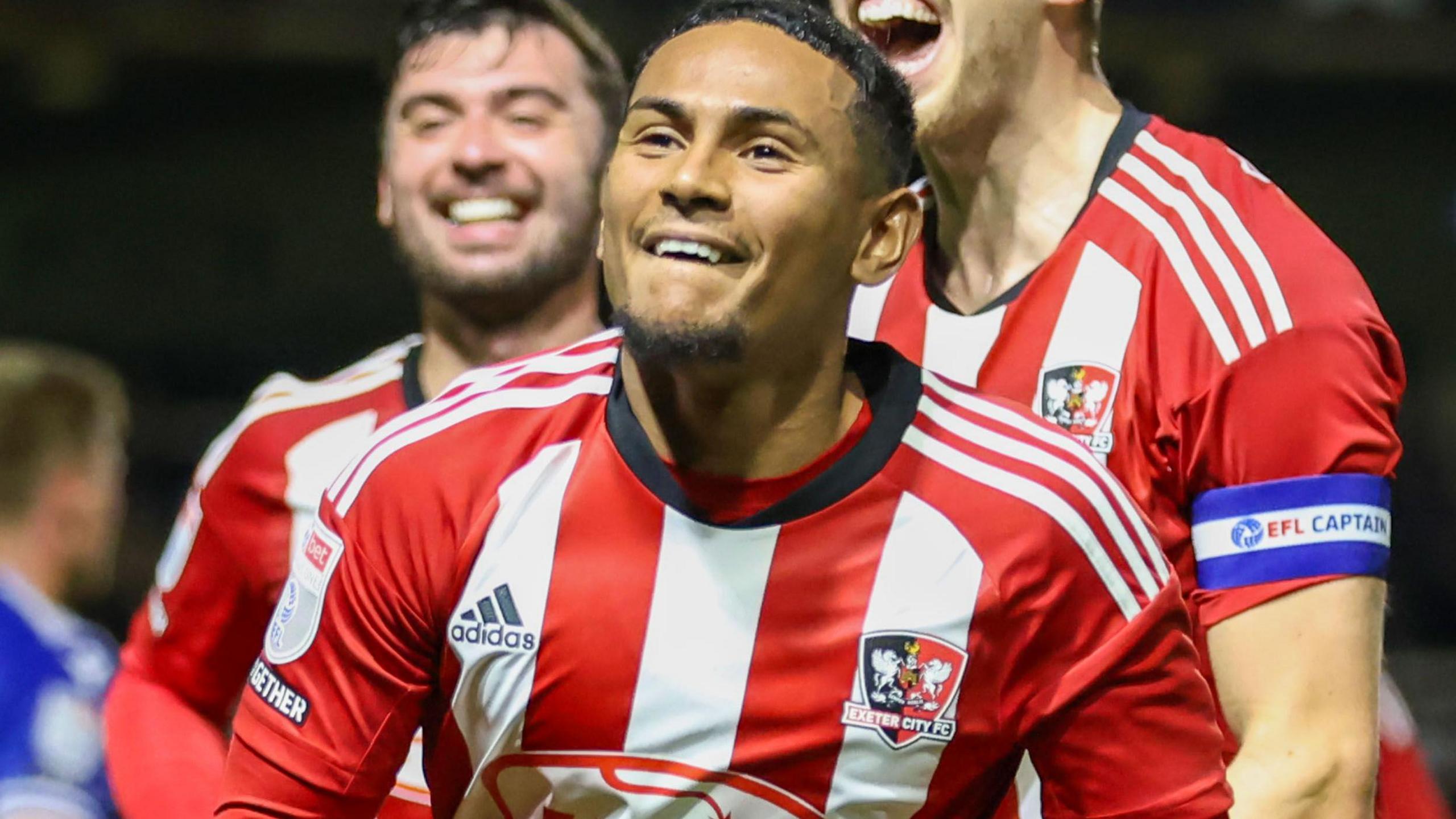 Demetri Mitchell celebrates scoring against Bristol Rovers in the EFL Trophy