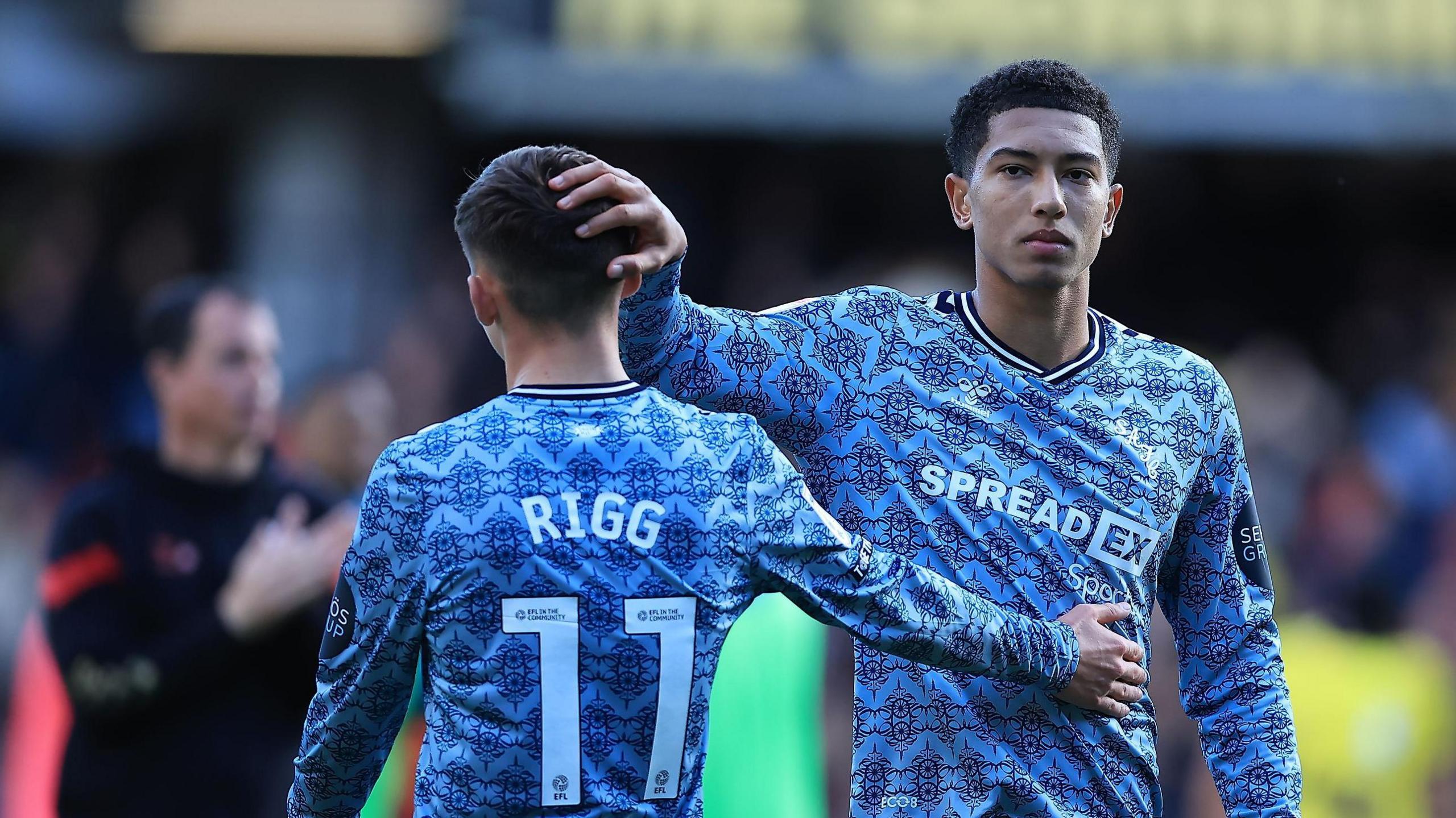 Chris Rigg (left) and Jobe Bellingham pat each other at the end of a Sunderland game 