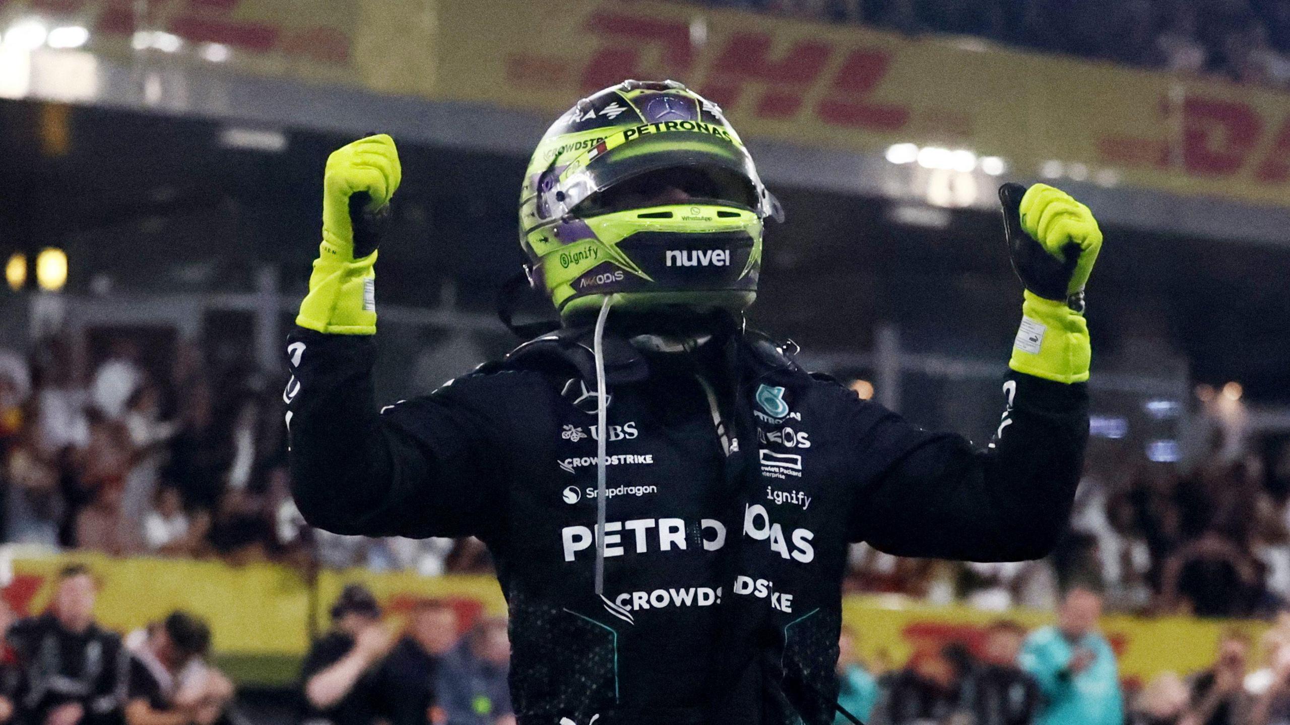 Lewis Hamilton celebrating after finishing fourth at the Abu Dhabi Grand Prix