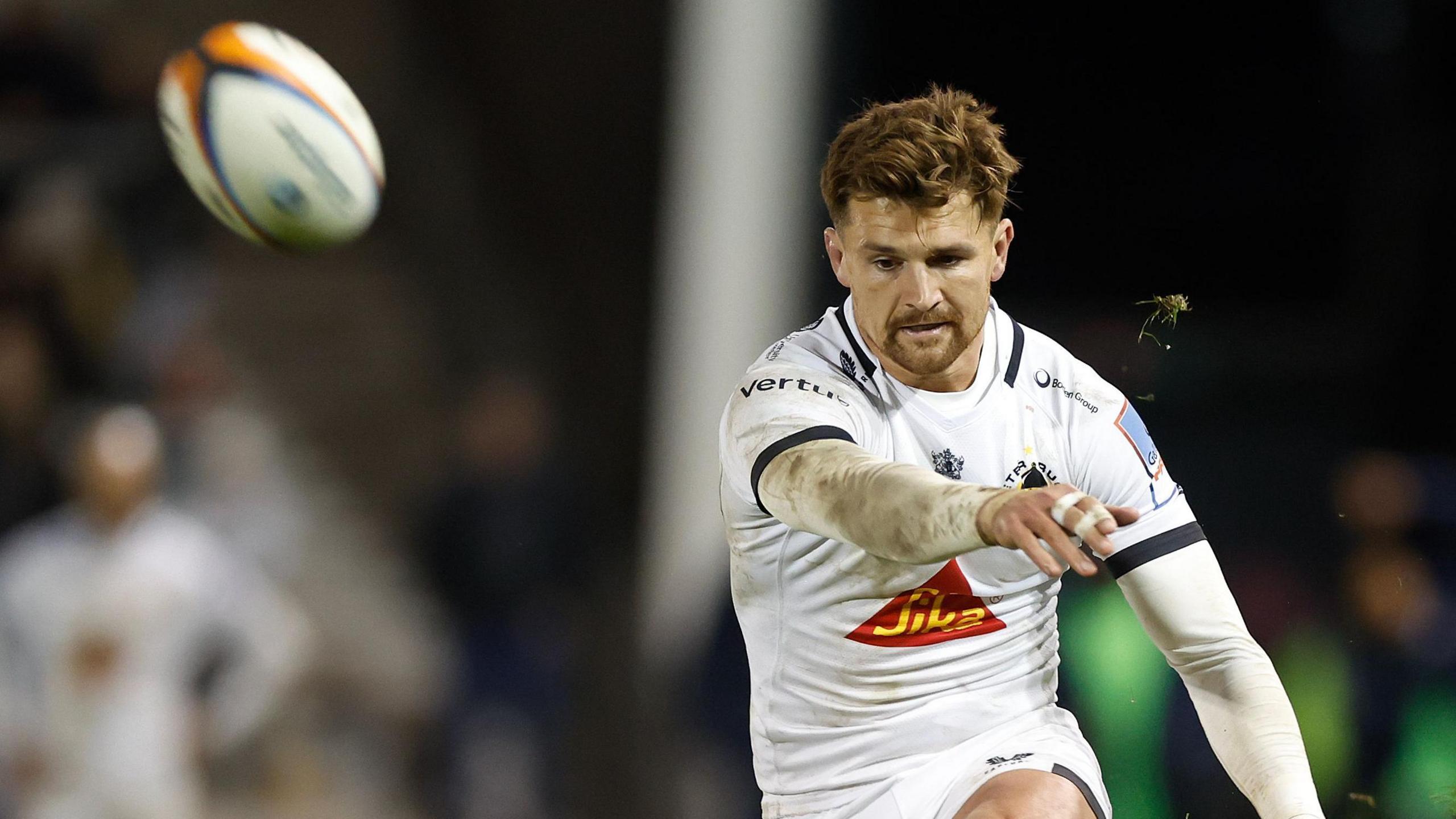 Henry Slade kicks a conversion