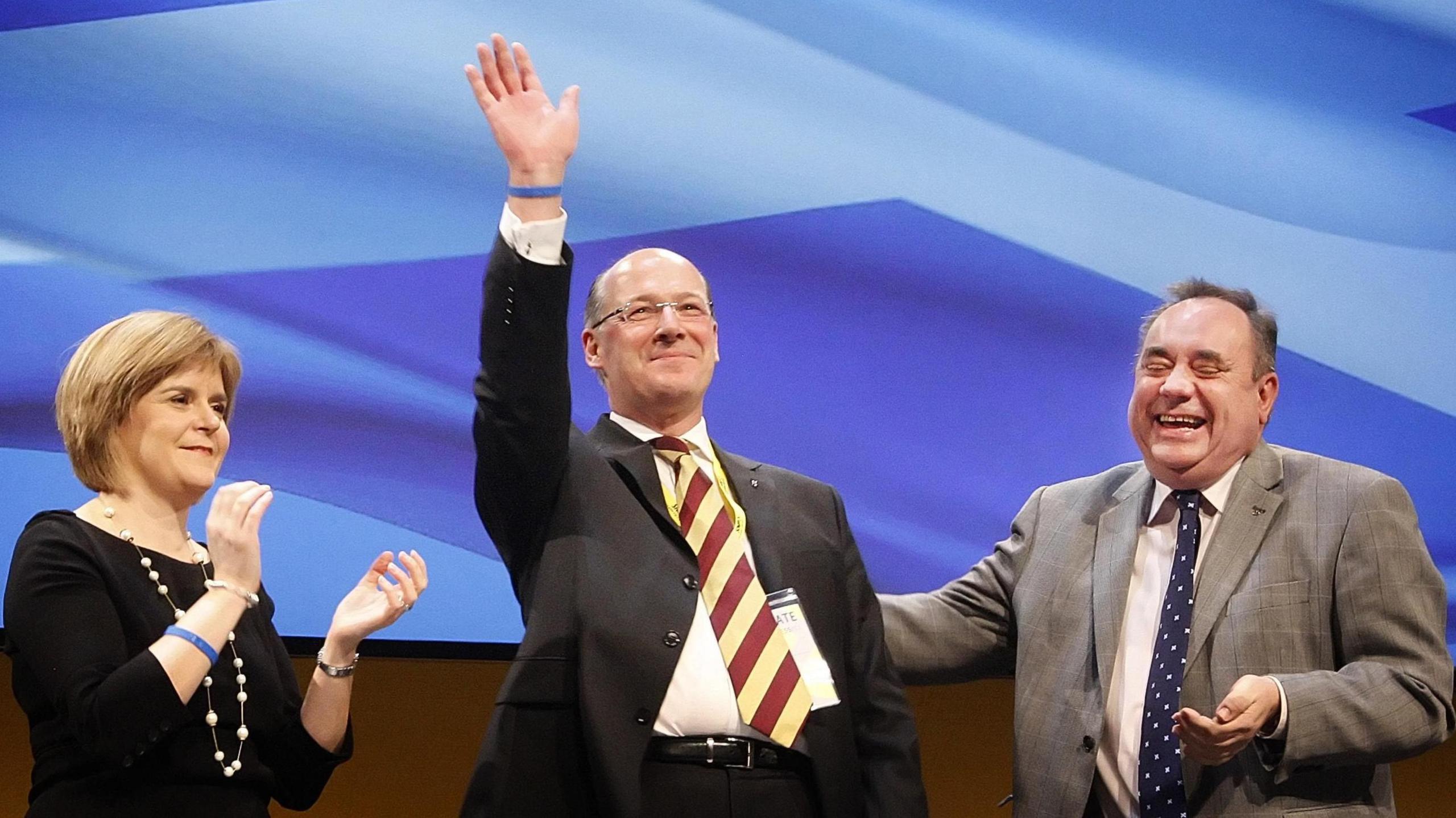 Deputy First Minister Nicola Sturgeon and First Minister Alex Salmond alongside John Swinney at the 2011 SNP conference in Inverness