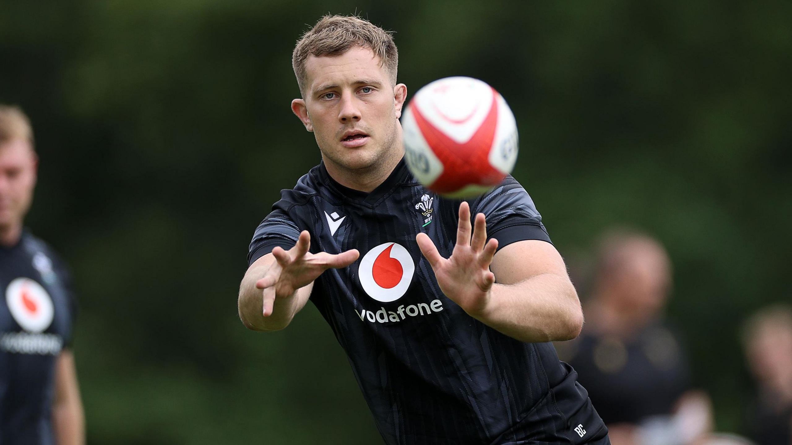 Ben Carter catches the ball in Wales training