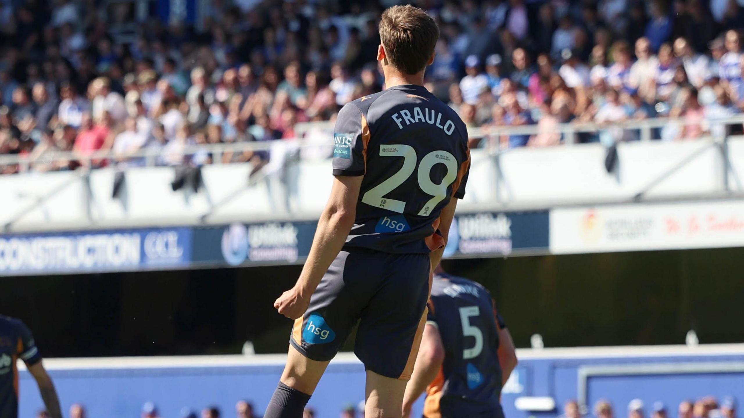 Oscar Fraulo leaps into the air in celebration