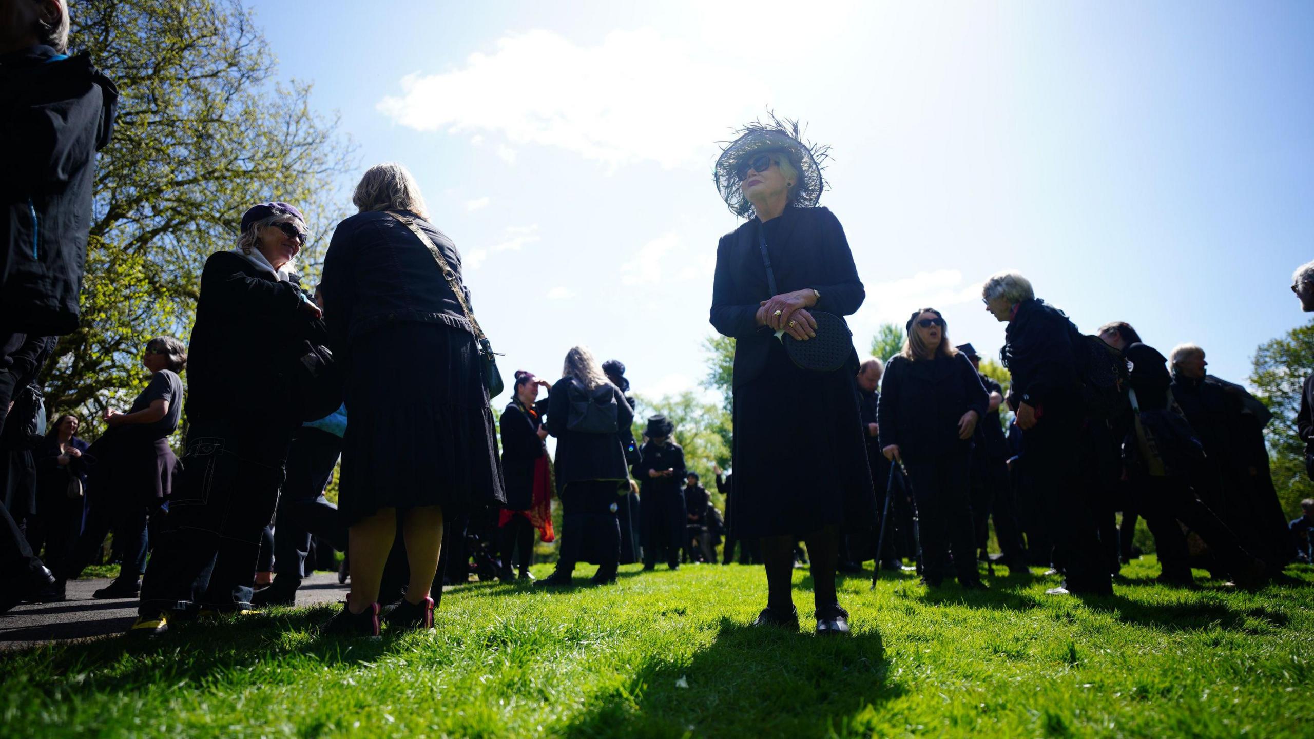 Mourners dressed in black