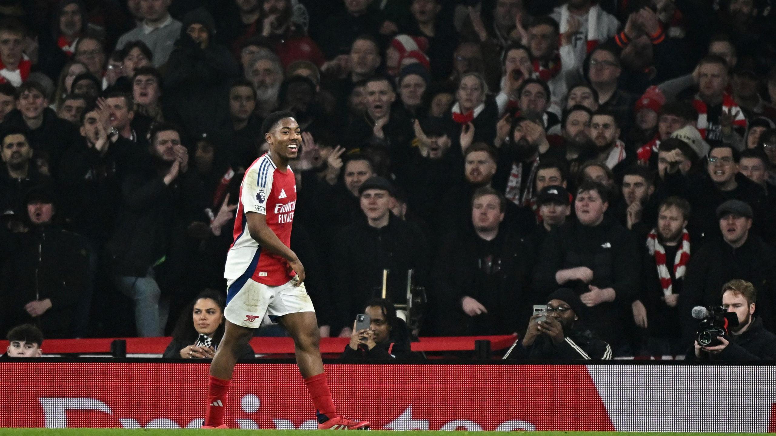 Arsenal's Myles Lewis-Skelly is substituted in the 87the minute and enjoys the atmosphere in his first north London derby against Tottenham