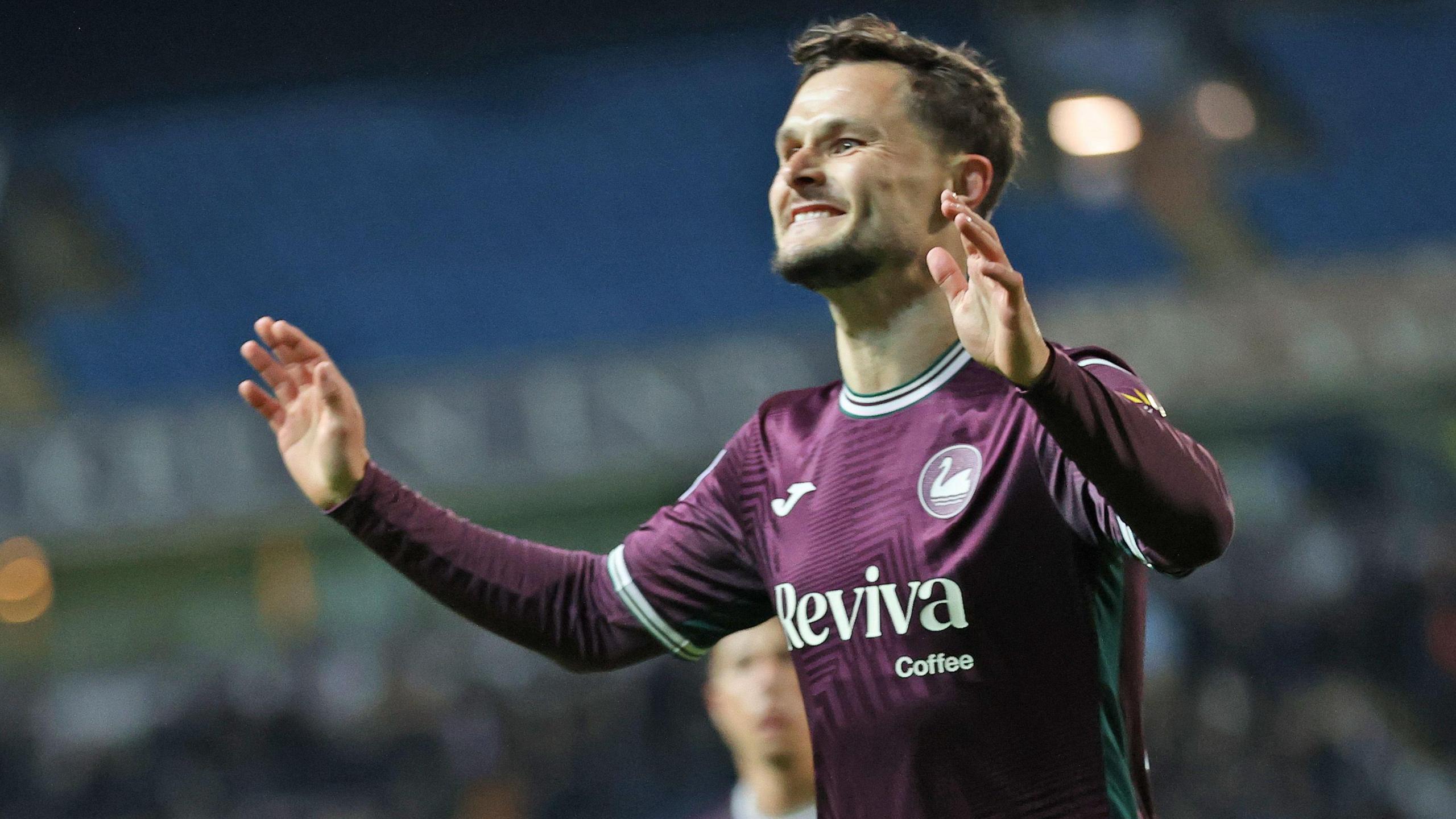 Liam Cullen celebrates at Blackburn